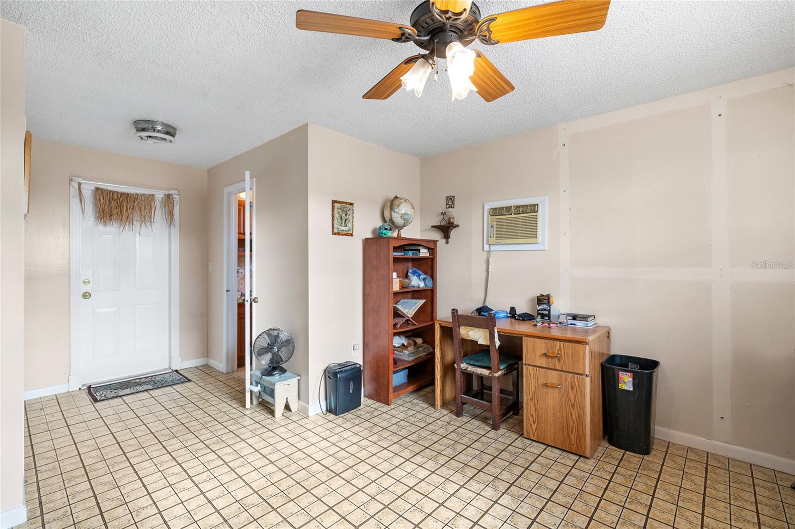 4th bedroom with ensuite full bathroom and access to backyard patio