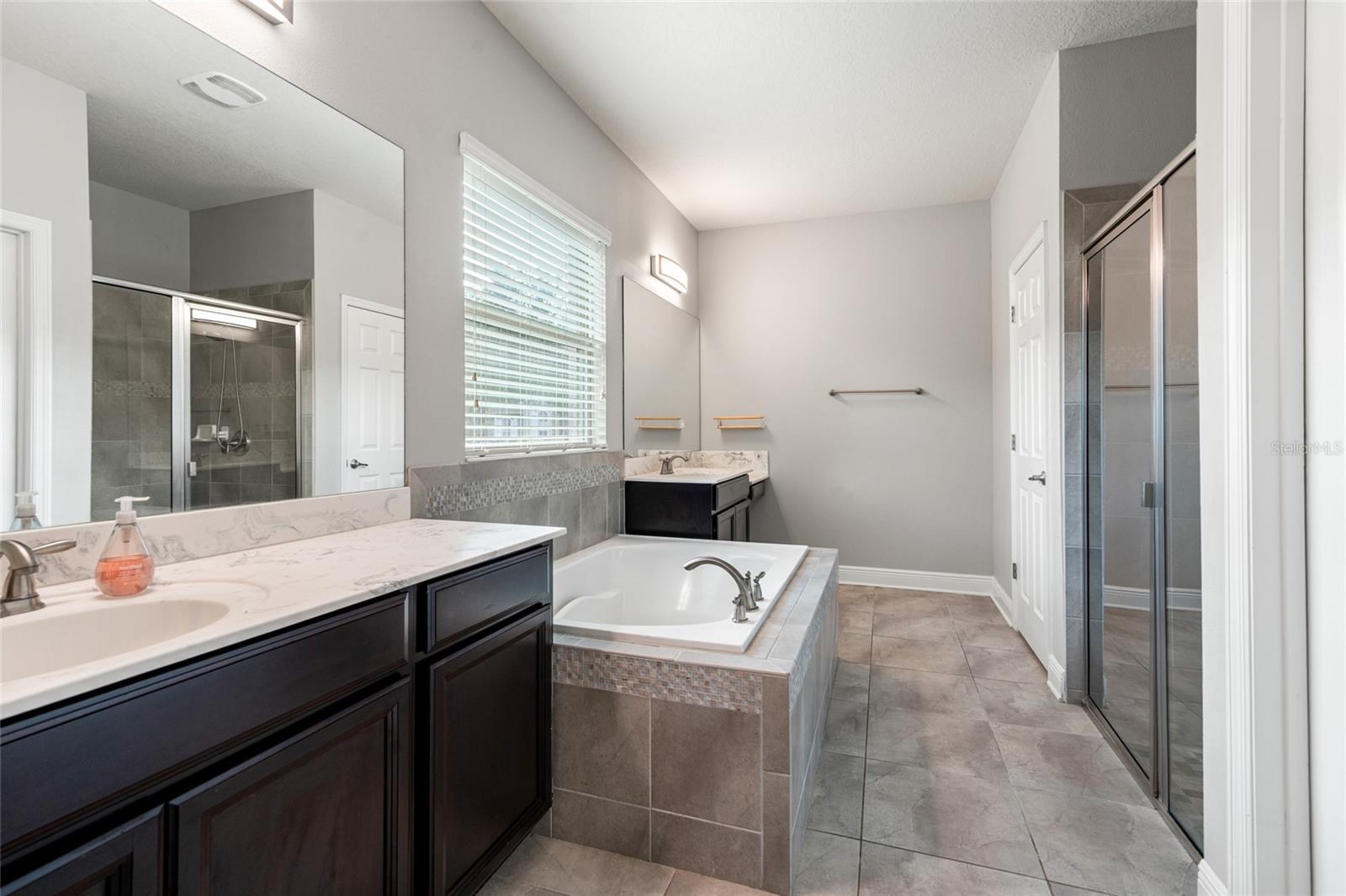 Split Vanity and Garden Tub Primary Bedroom Ensuite 1st Floor