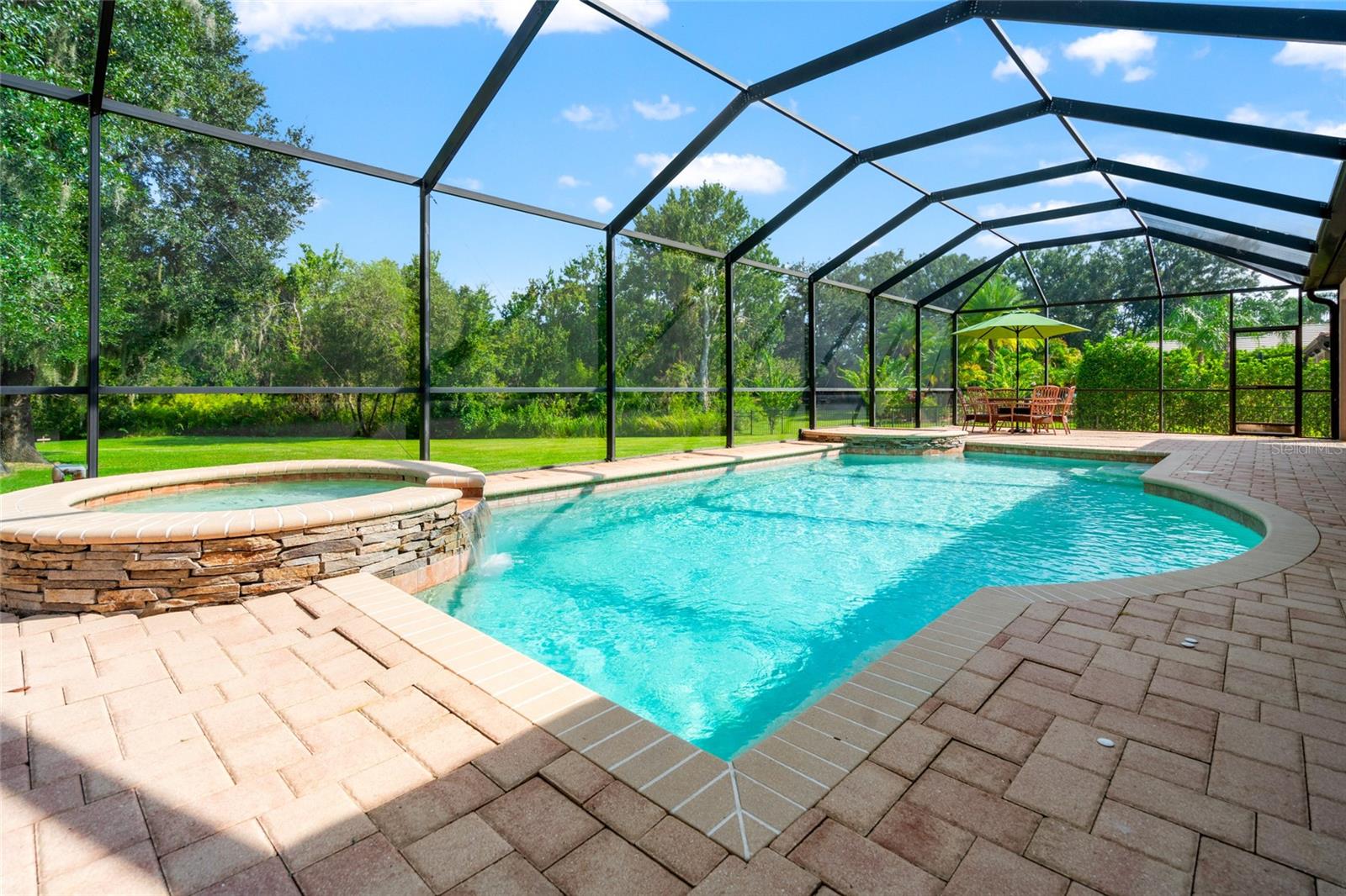 Full Pool and Backyard View
