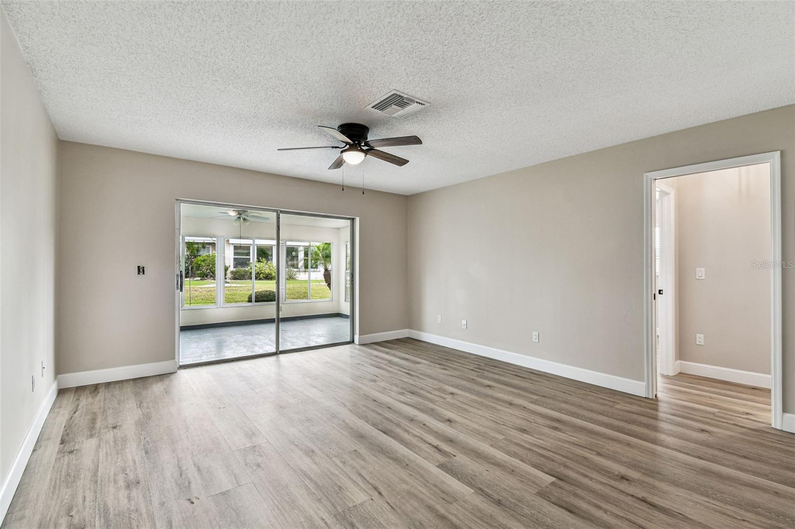 Family room looking out to the lanai.