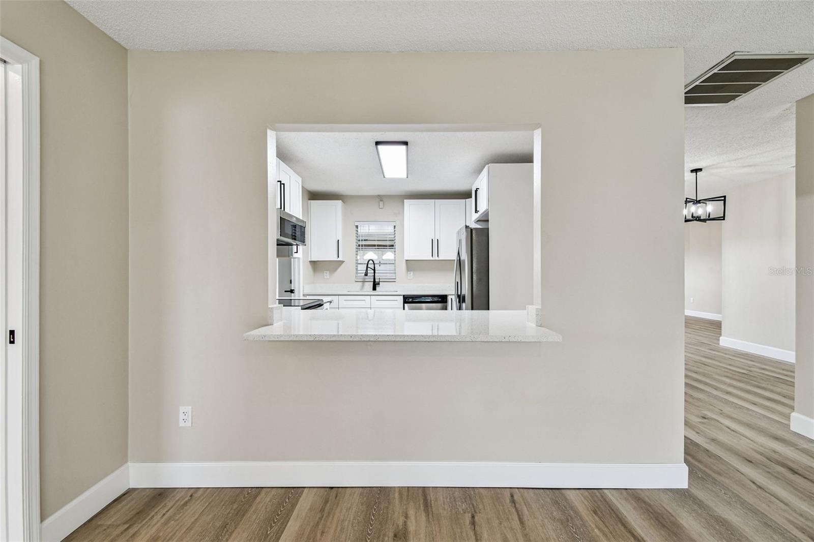 View from family room into the kitchen