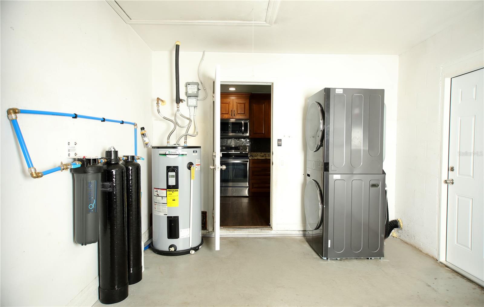Laundry room in Garage directly off Kitchen