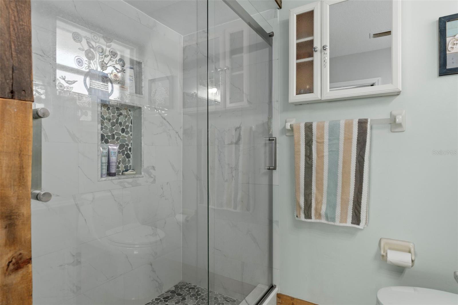 Beautiful walk in shower in Primary Bathroom w/ niche