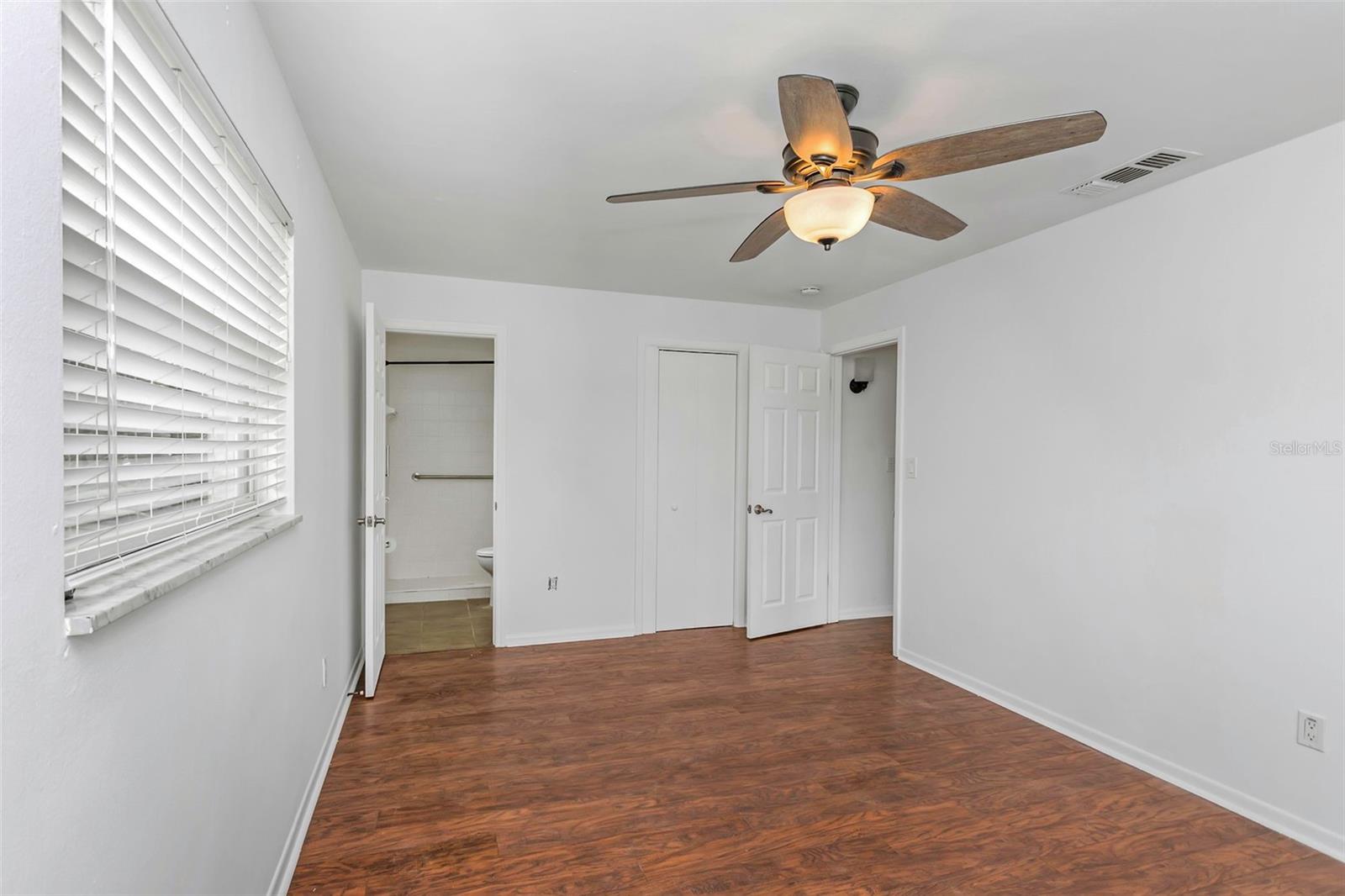 primary bedroom en suite bath and walk in closet