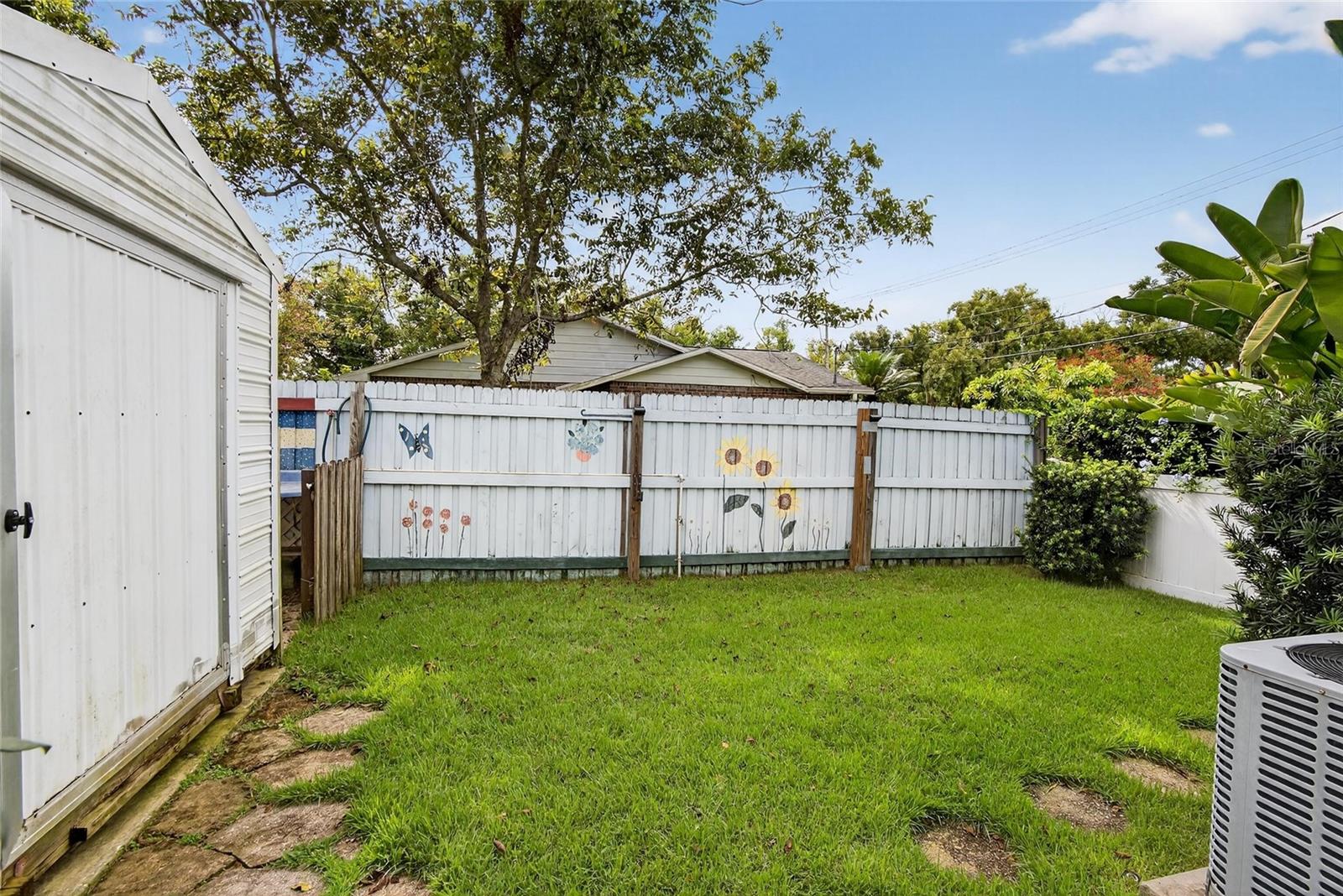 YARD WITH STORAGE SHED