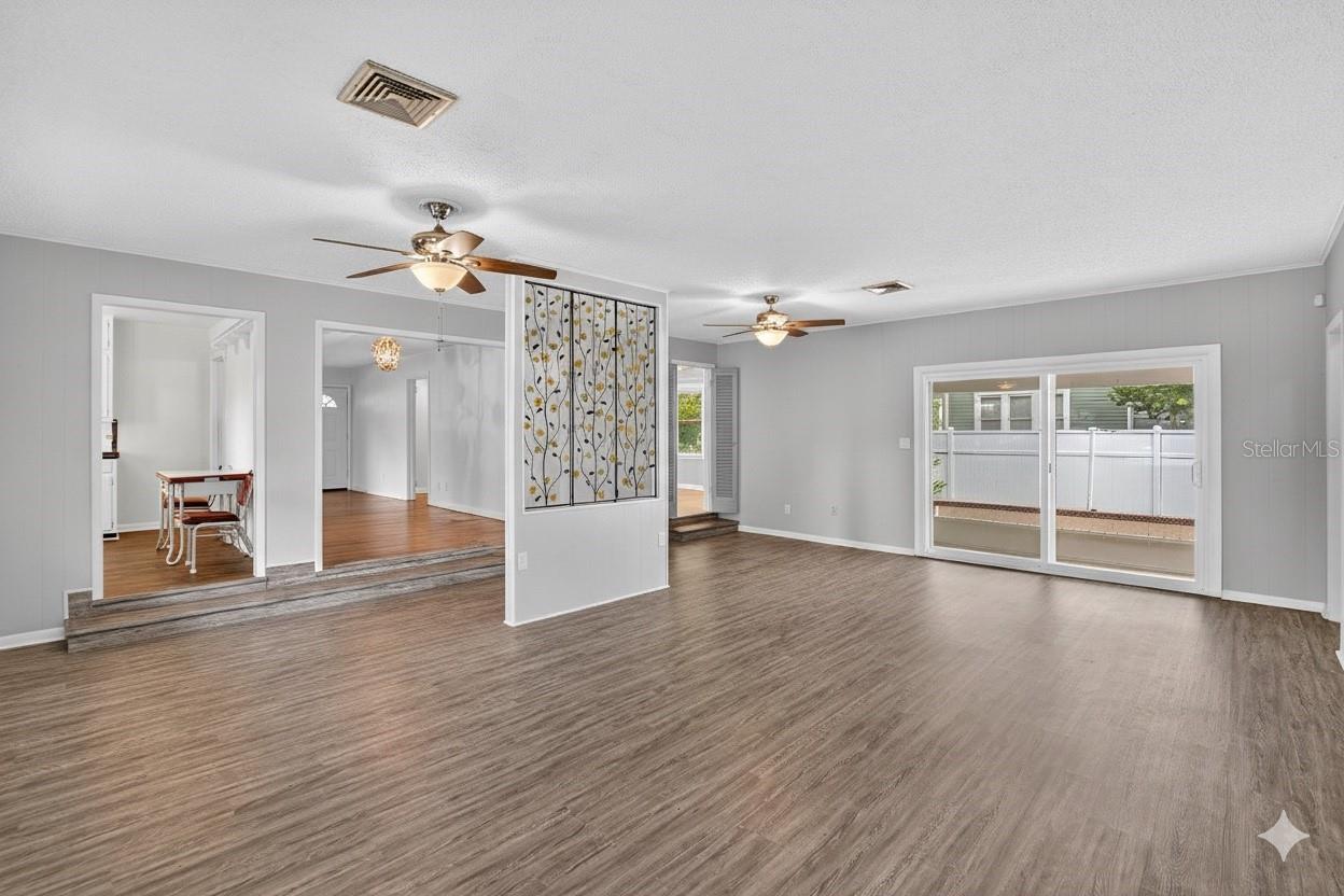 FAMILY ROOM TO KITCHEN AND DINING ROOM