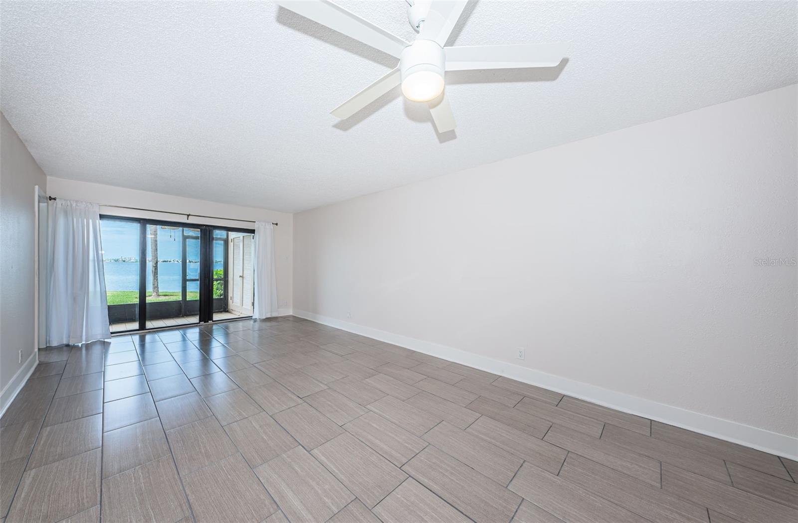 Beautiful View of the Bay framed by the Impact Resistant Sliding Door