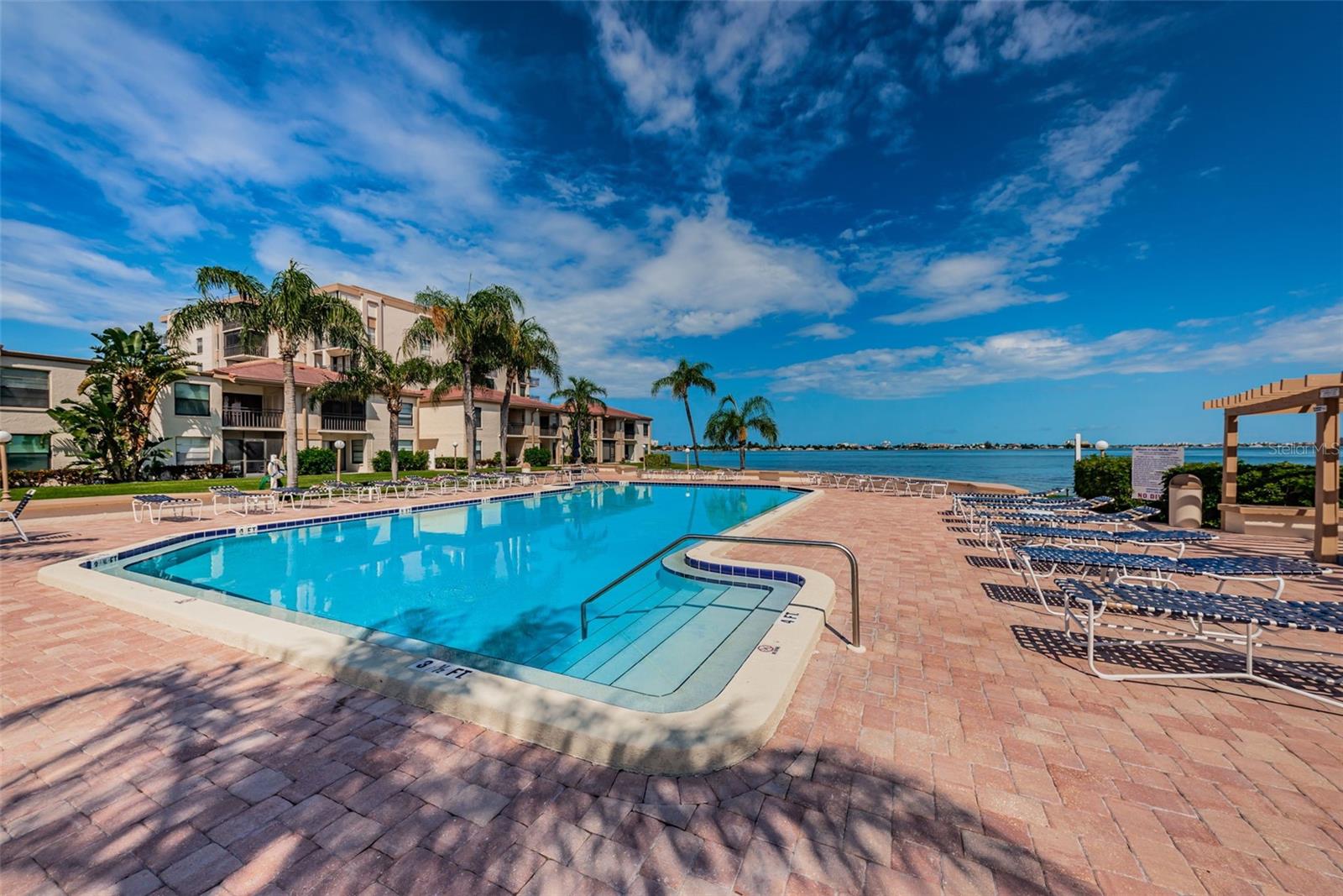 Heated Pool & Spa overlooks the Bay