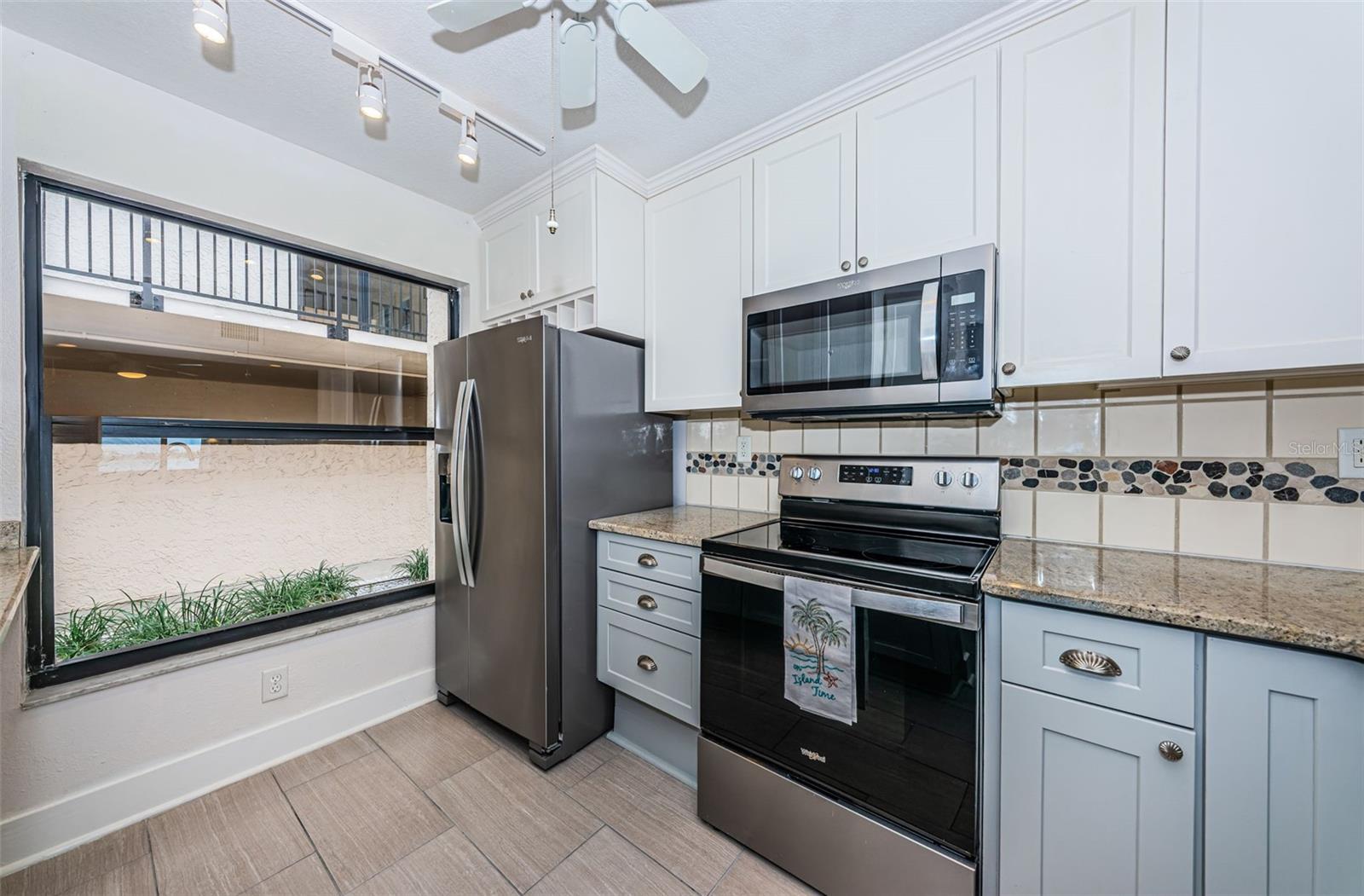 Beautifully Updated Kitchen with Granite Countertops