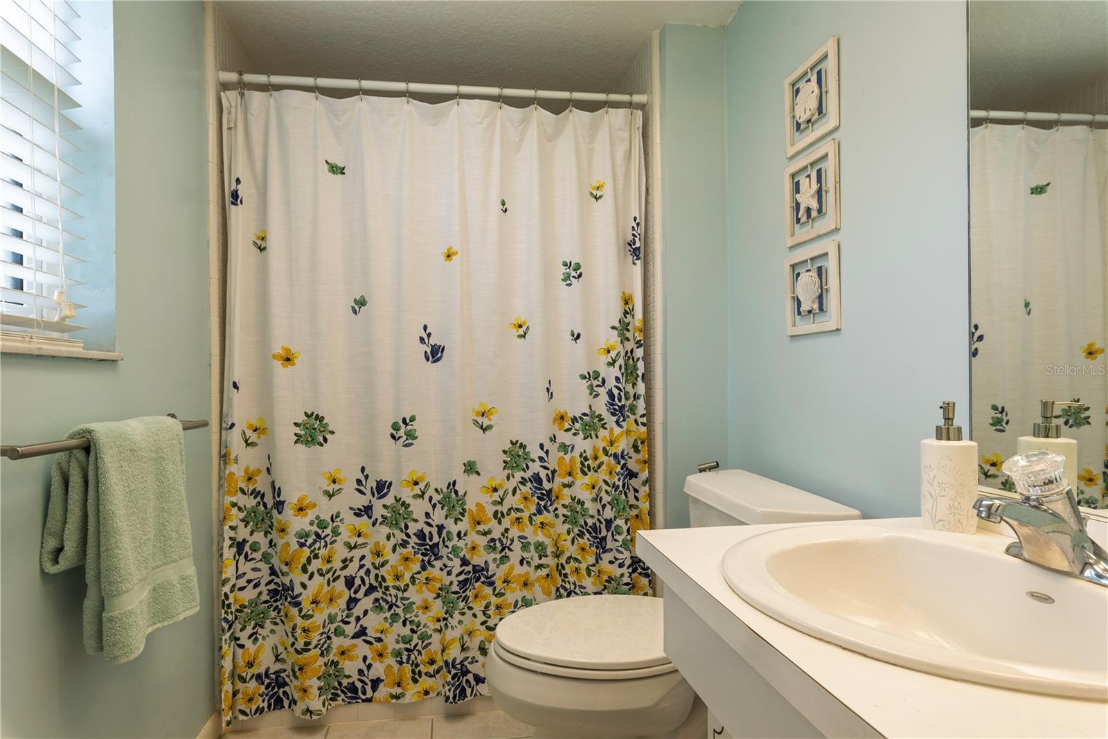 Primary ensuite bathroom with walk-in shower.