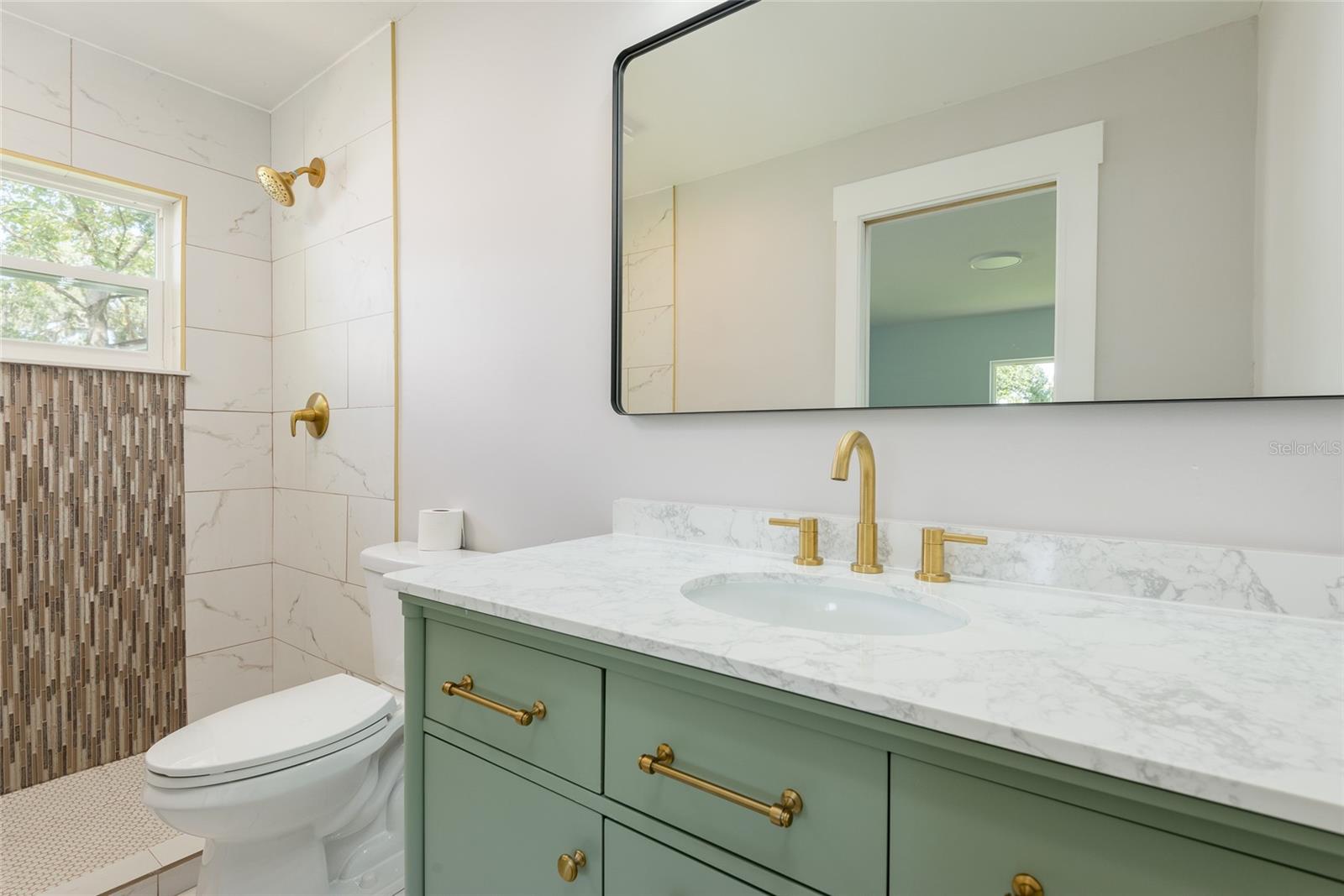 bedroom 3 with en-suite bathroom.