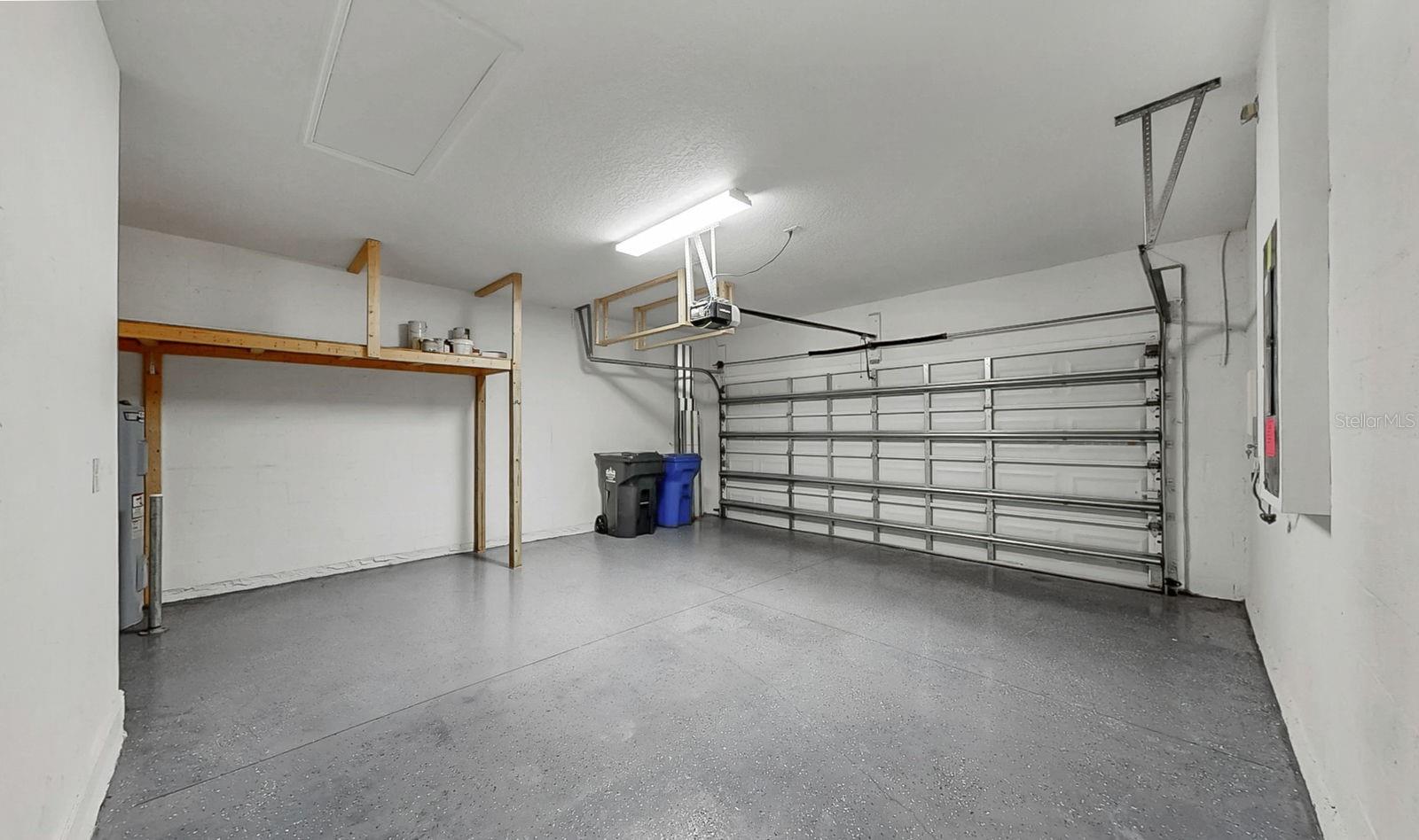 Garage with Shelving and Epoxy Flooring