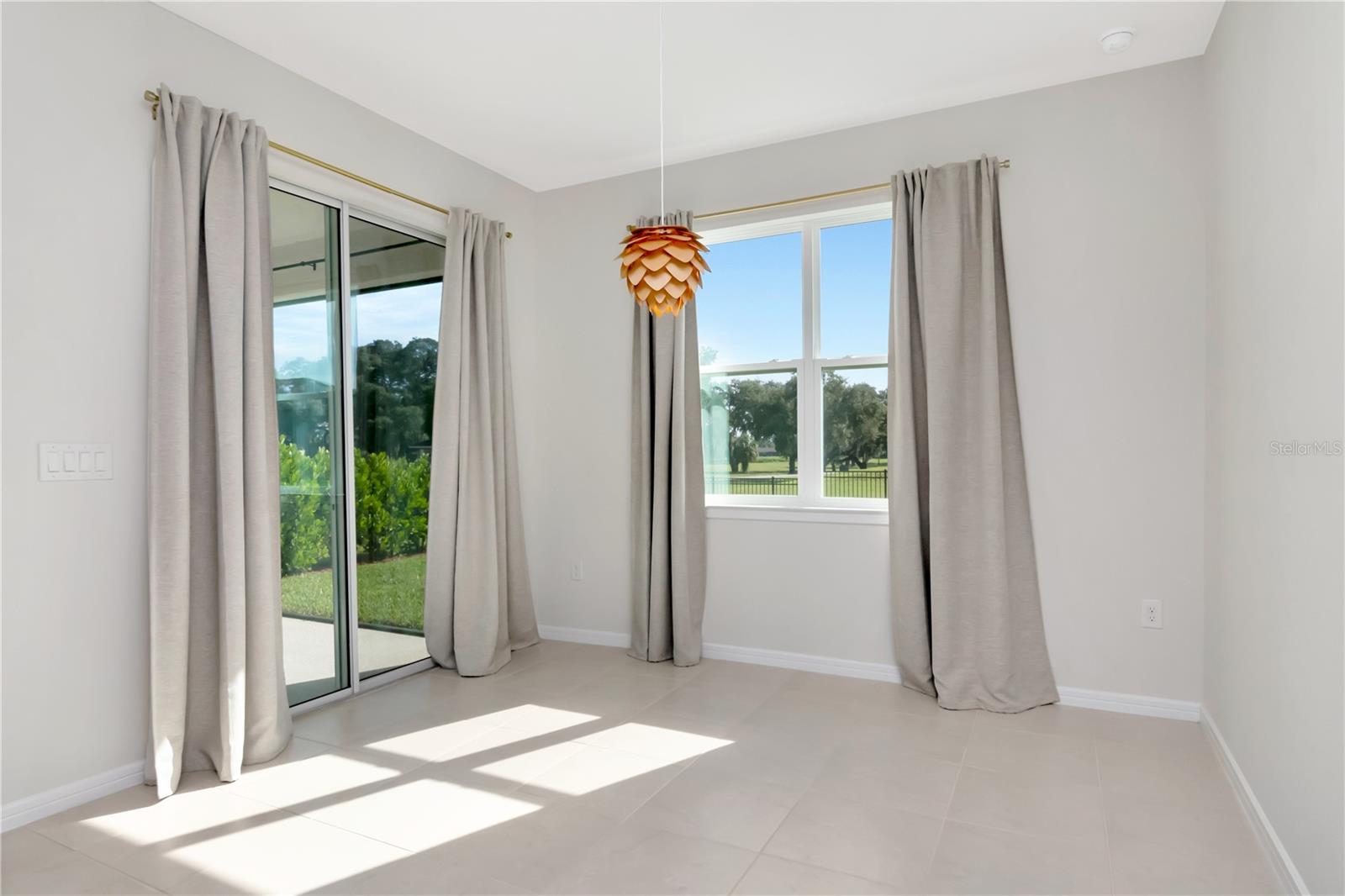 Dining Room with Windows & Sliding Glass Doors