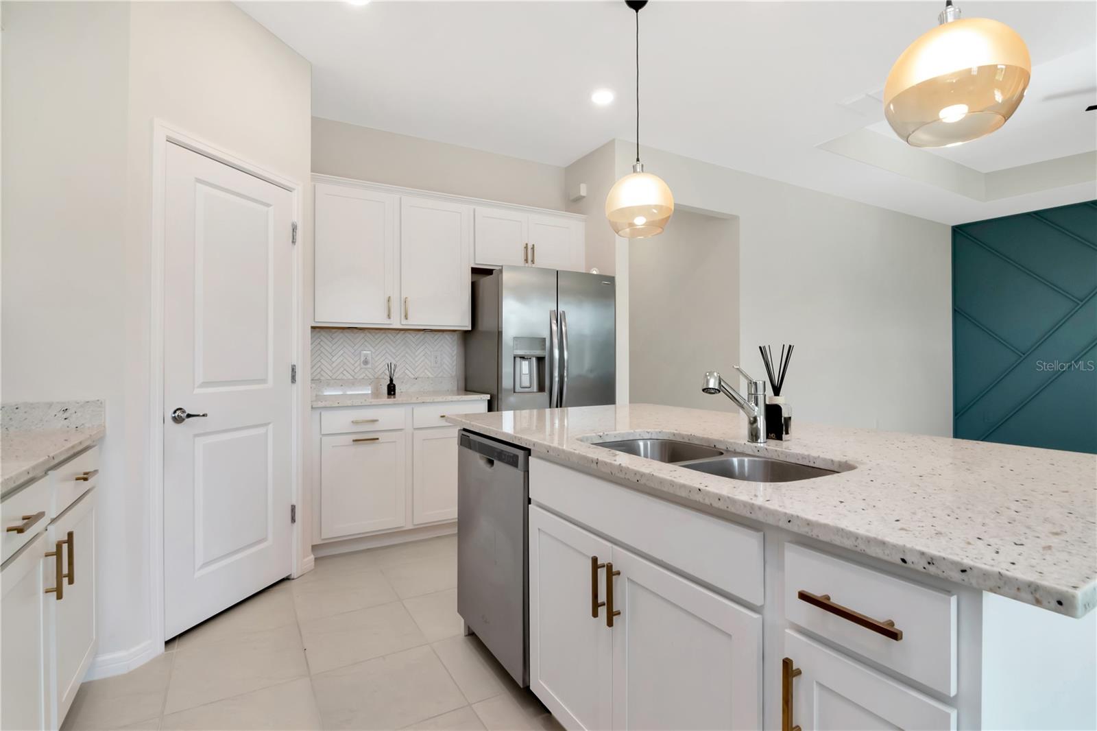 Kitchen with Island and Pendant Lighting