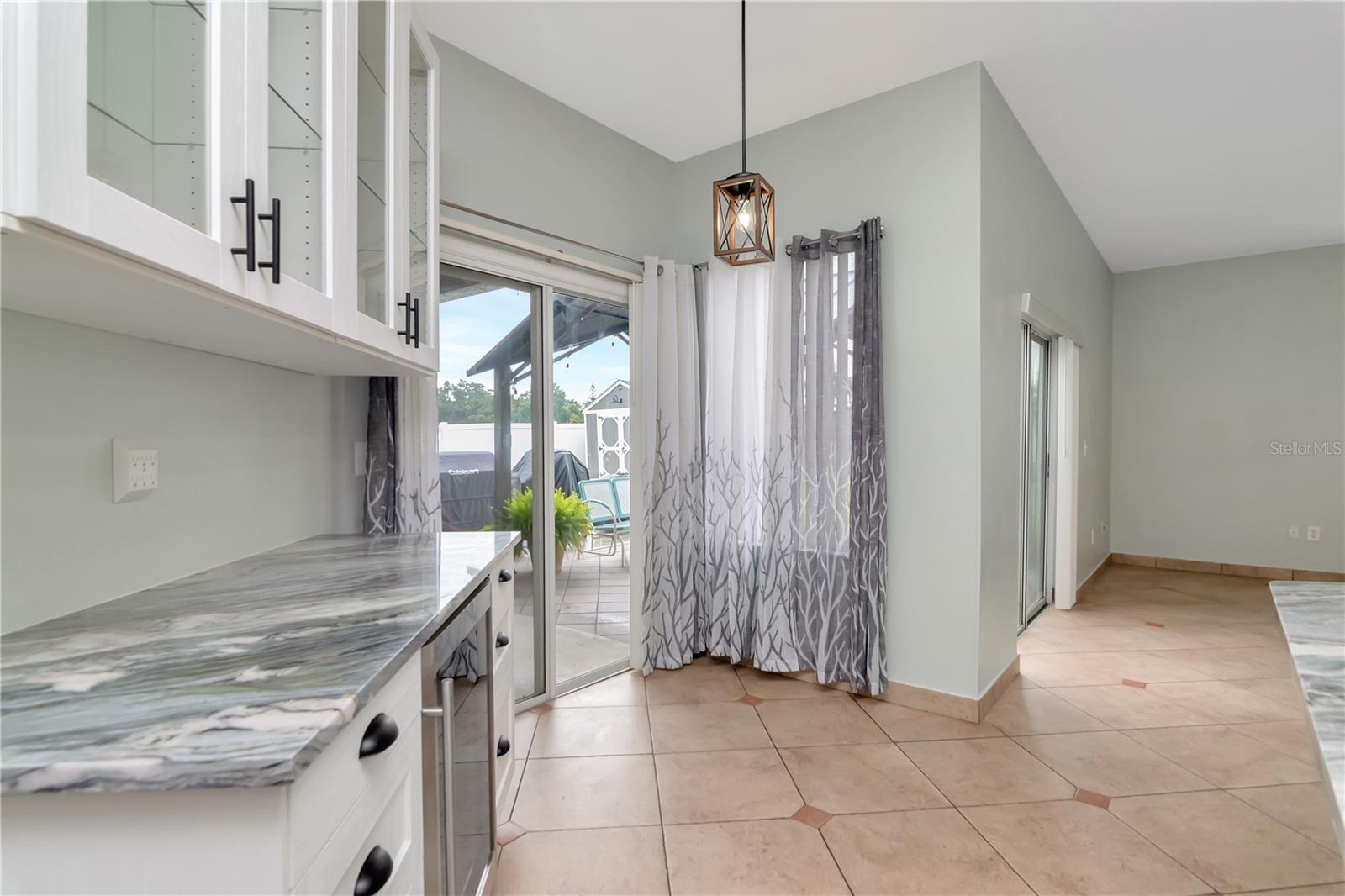 Butler's Pantry & Eat-In Kithen Area with Sliding Glass Doors & Windows