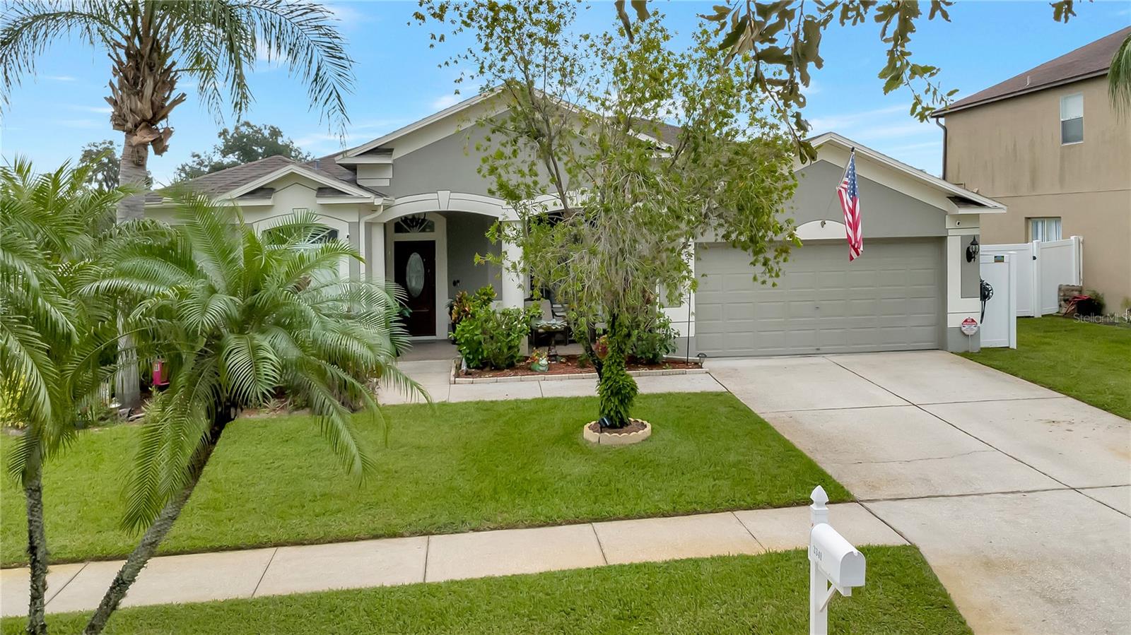 Front of Home with Manicured Landscaping