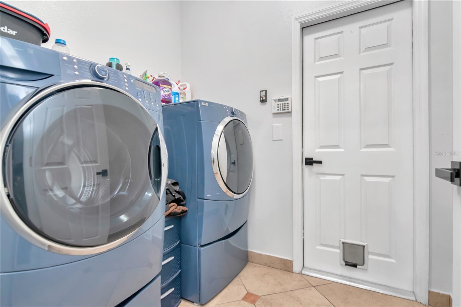 Inside Laundry Room, Washer & Dryer with Pedastals