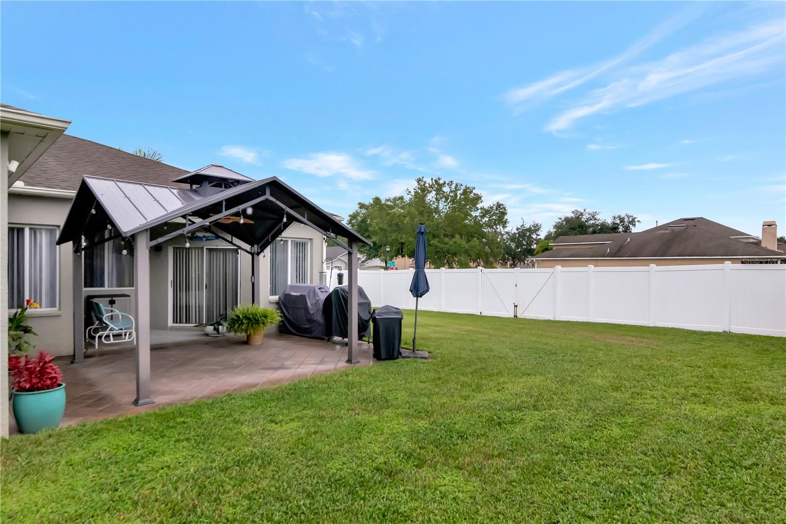 Backyard, Extended Lanai, Gazebo, and Fully Fenced