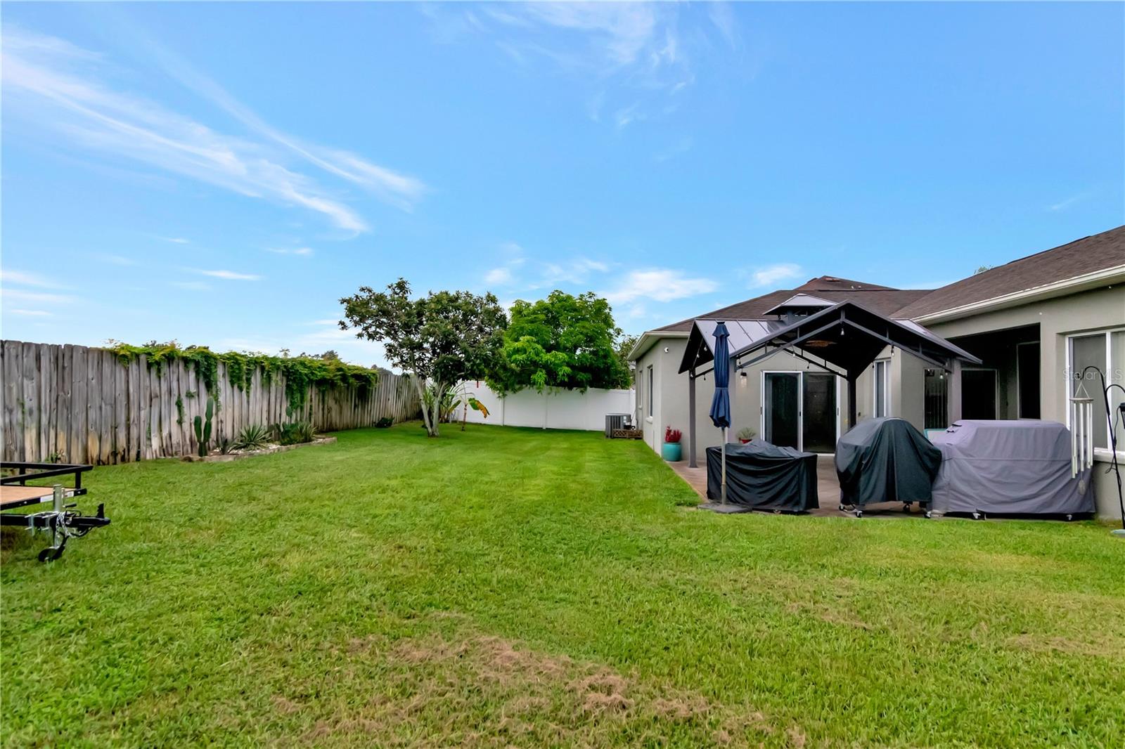 Backyard with Extended Lanai, Gazebo, and Shed