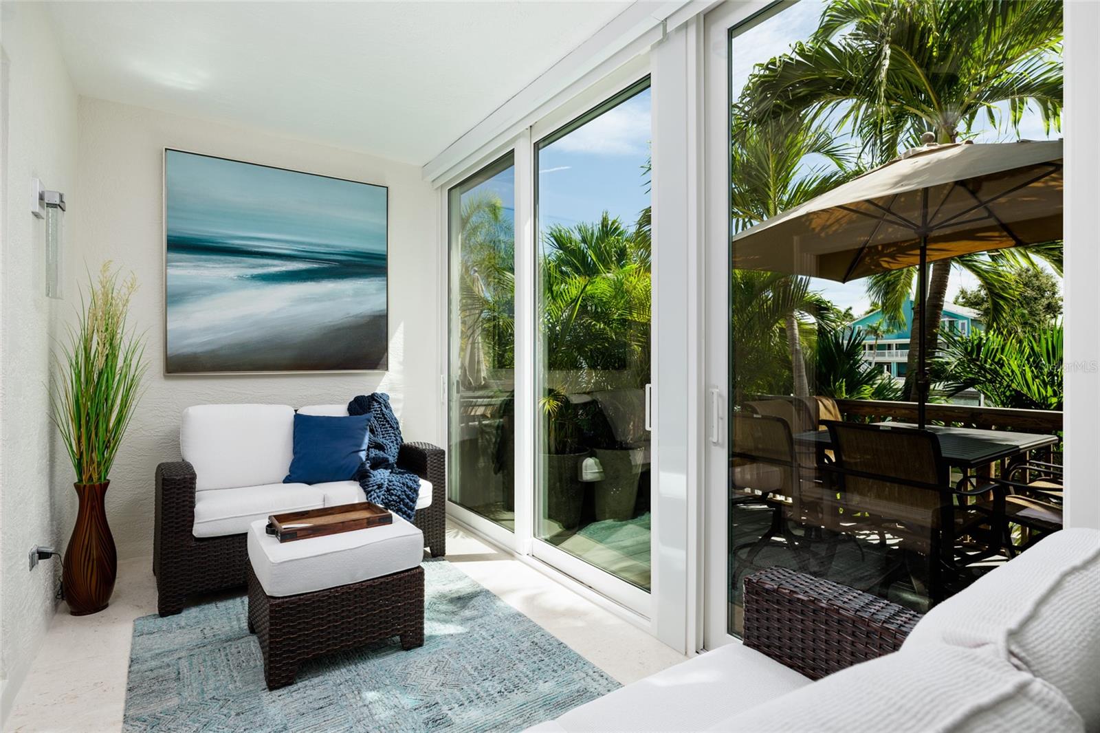 Seamless indoor-outdoor living overlooking the dock