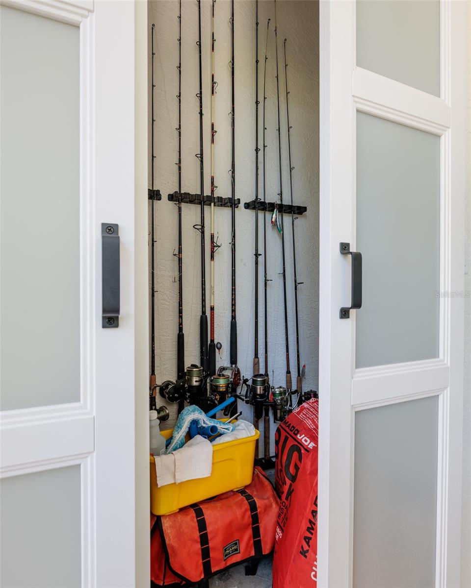 Custom storage for rods and reels steps from the dock