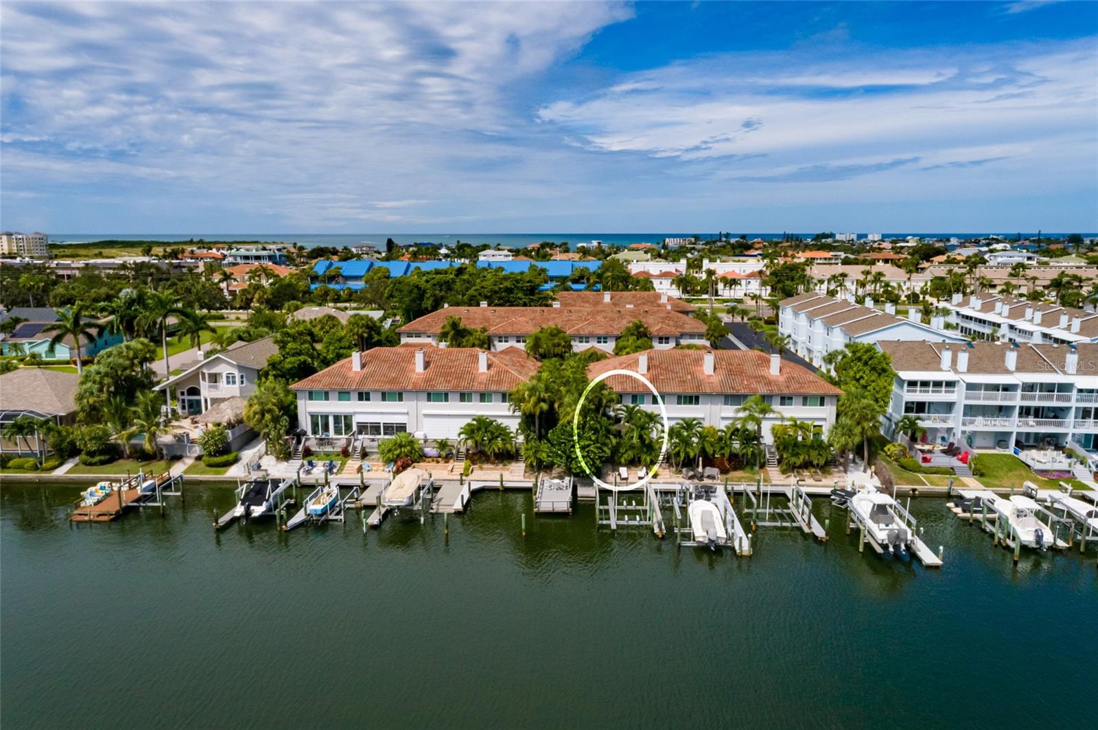 Highly coveted end unit with extra windows brings the outside in
