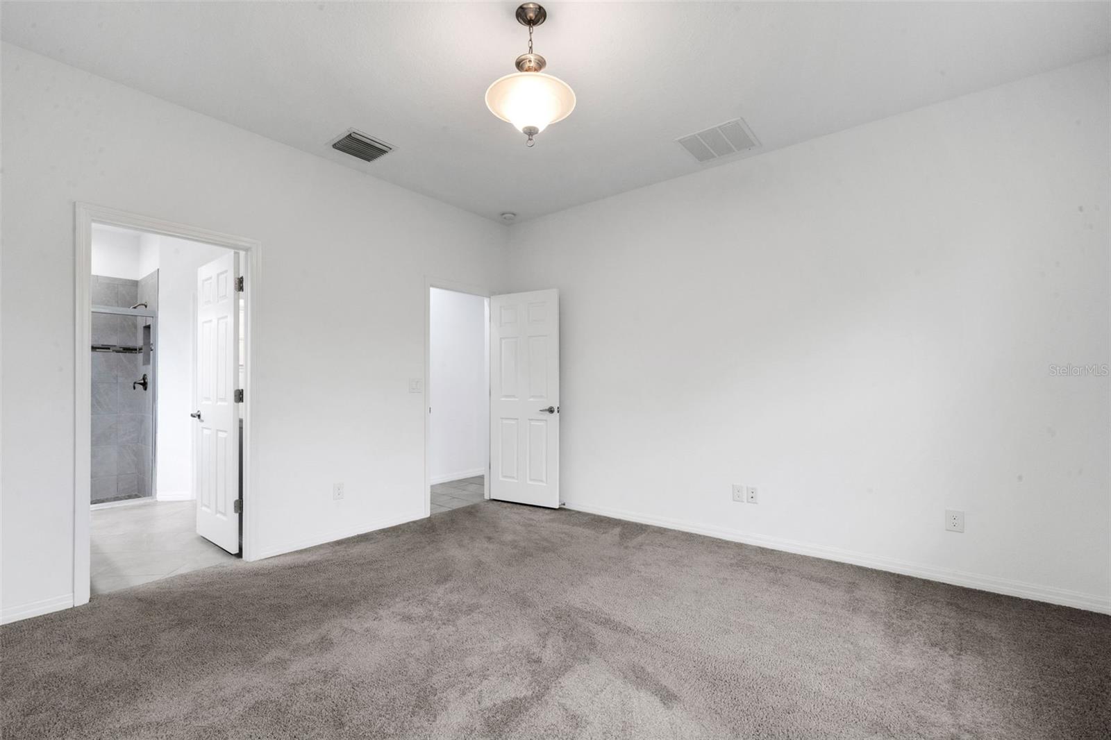 Primary Bedroom w/ Ensuite