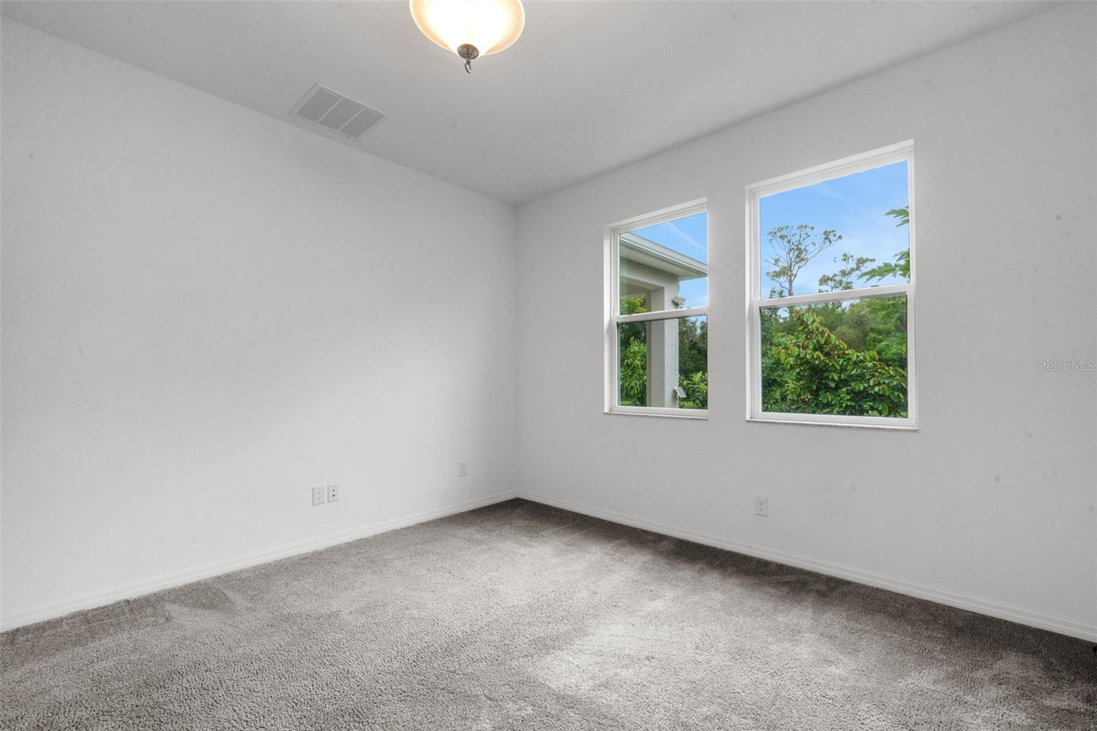 Primary Bedroom with Garden/Pond View