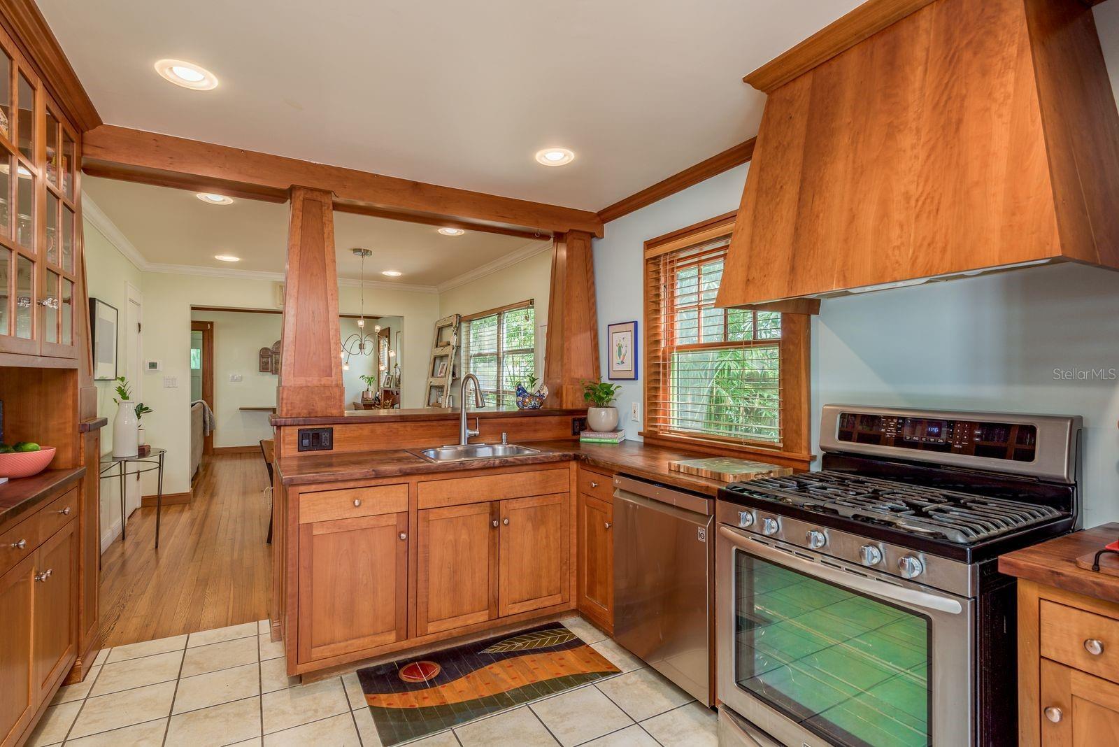 KITCHEN W/ CUSTOM CABINETRY AND SOLID MAPLE COUNTERS