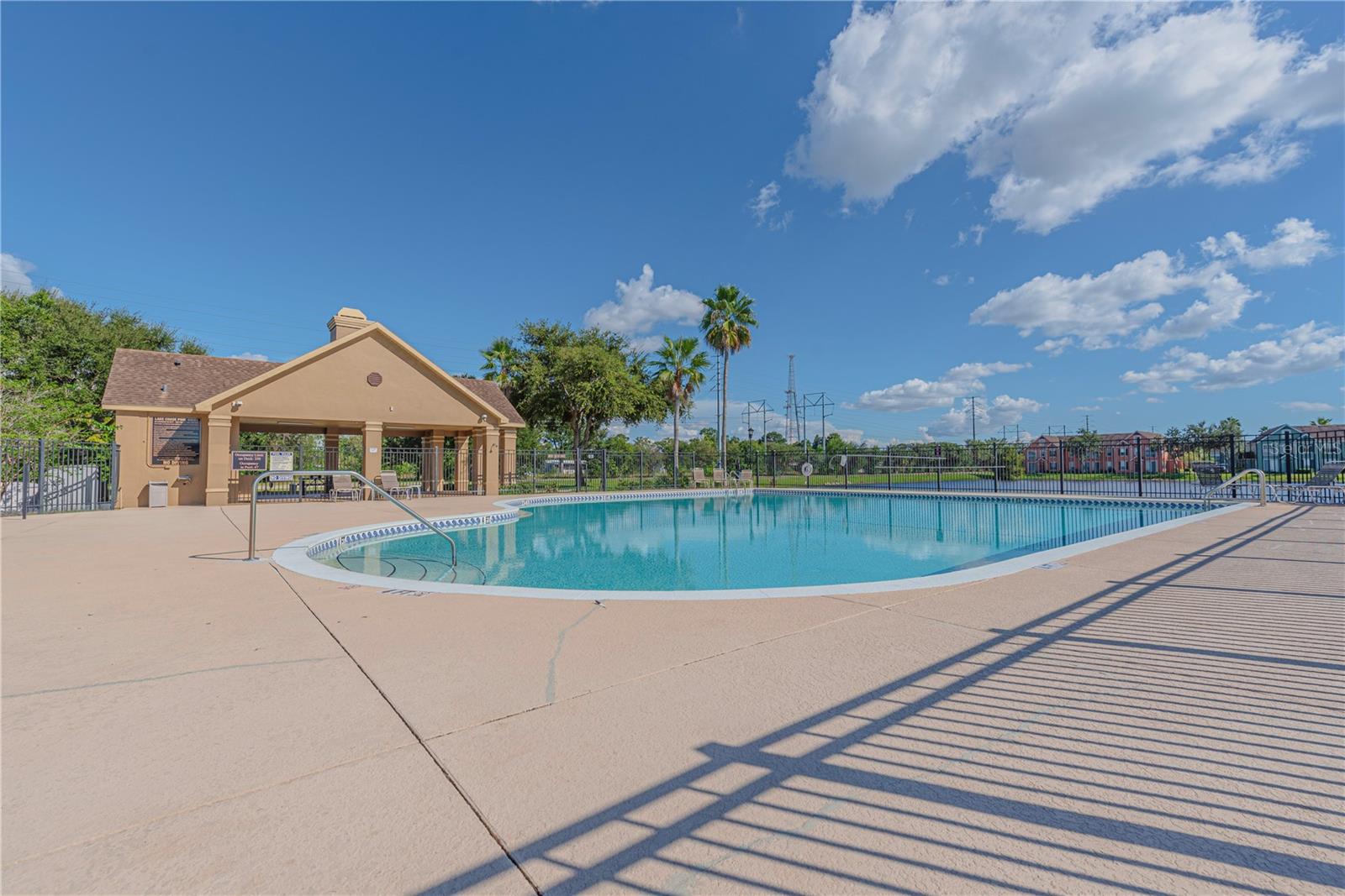 Pool lanai with lake view.