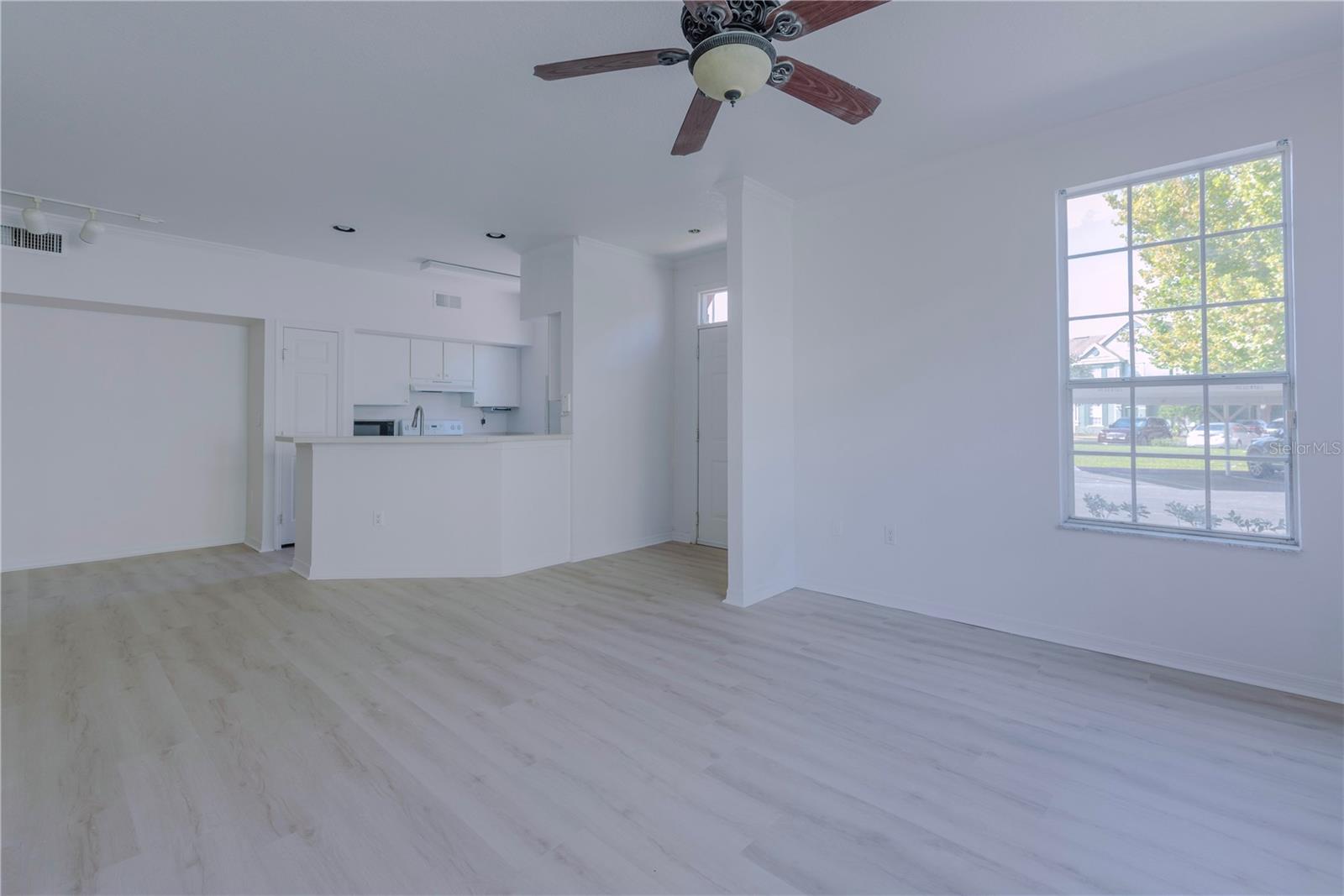 Open floor plan with luxury vinyl flooring.
