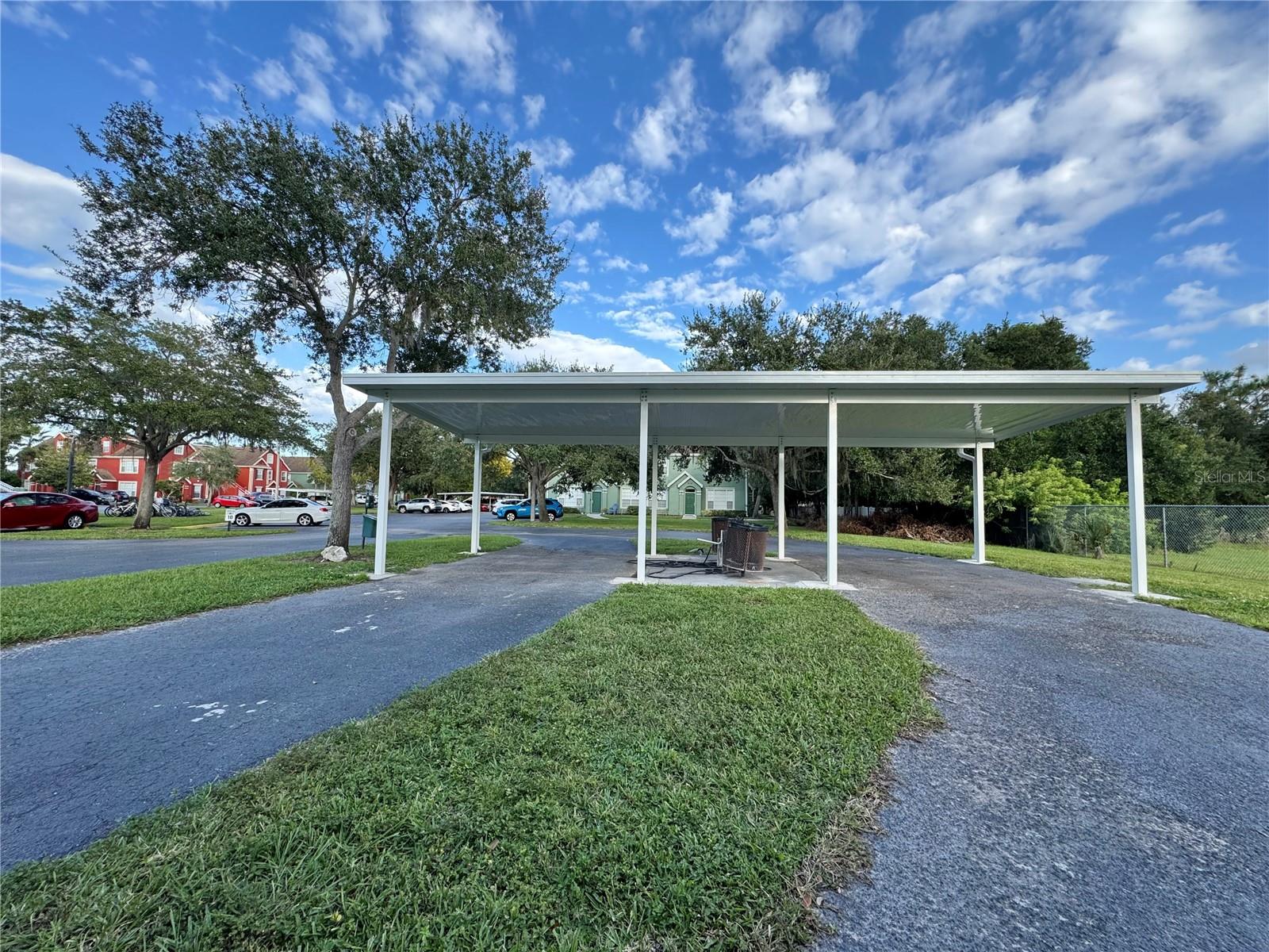 Covered car wash station.