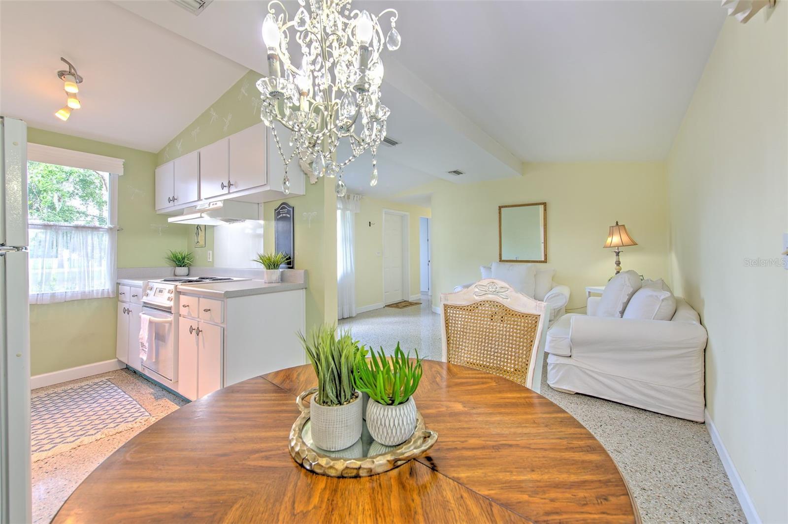 View of Dining Area, Kitchen, Living Room and Front Entrance