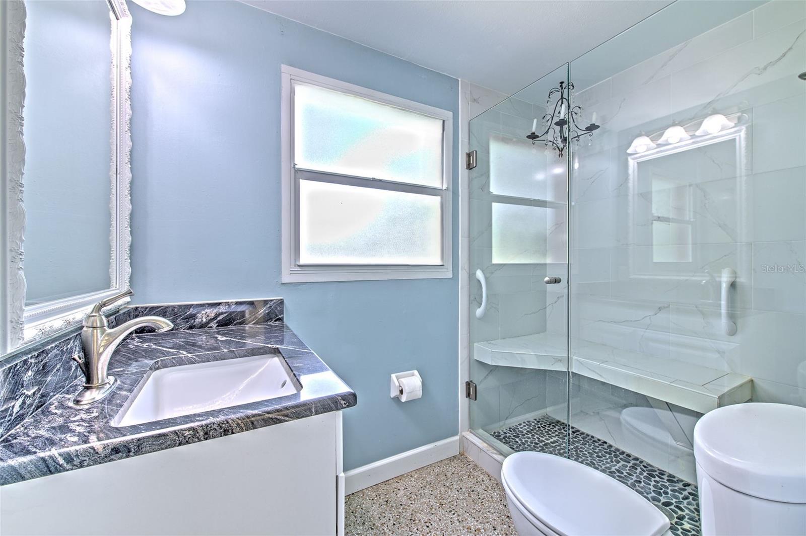 Updated Bathroom with built in shower bench seat