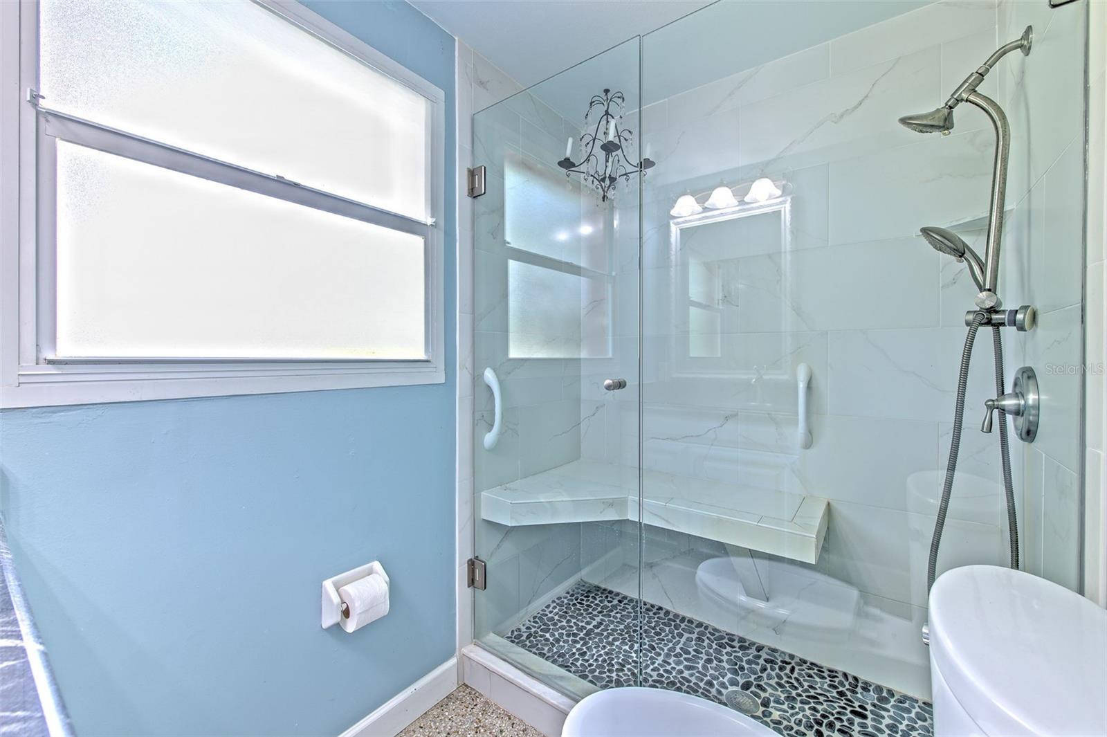 Updated Bathroom with built in shower bench seat