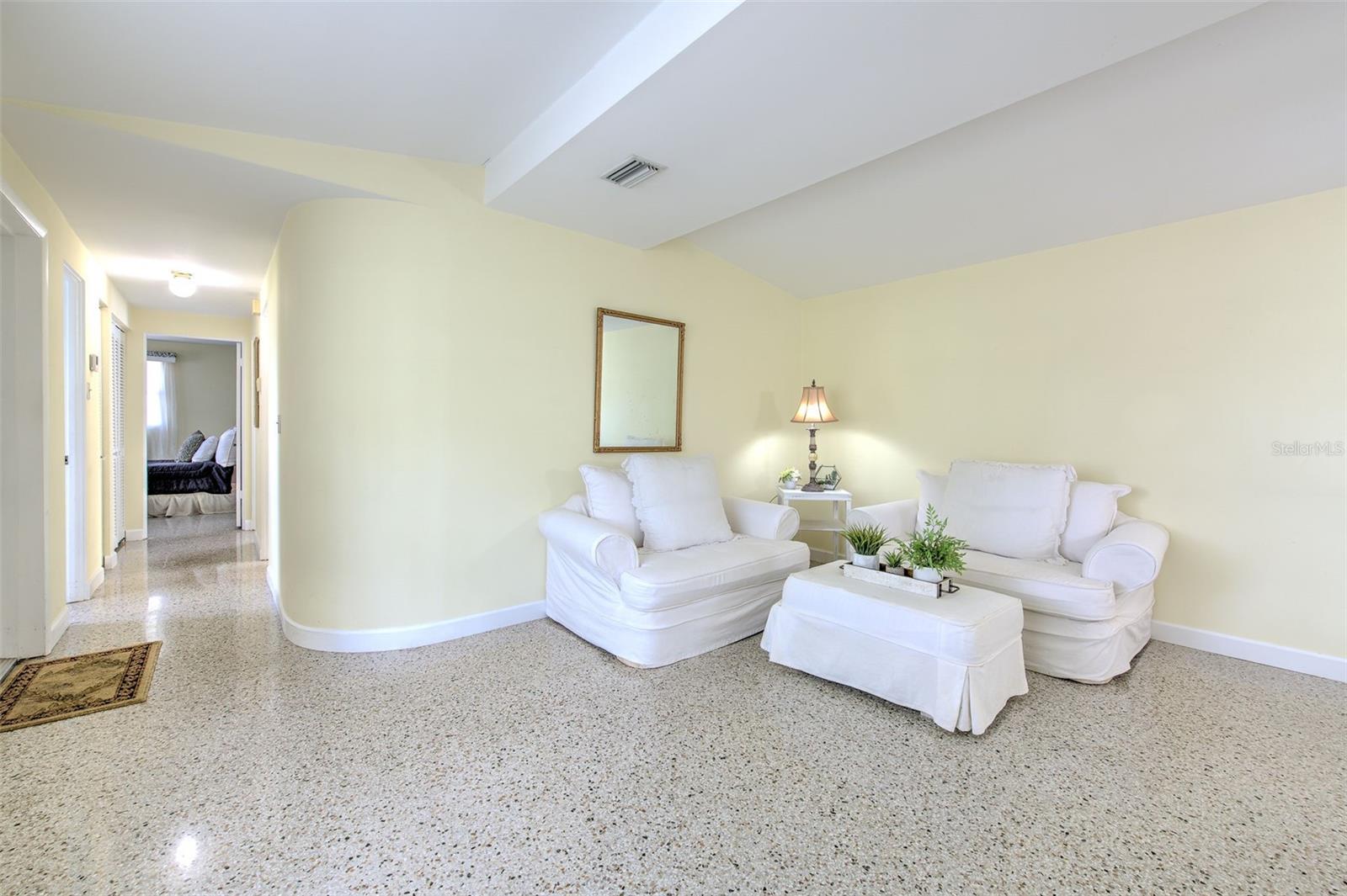 Spacious Living Room and Hallway to Bedrooms & Bathroom