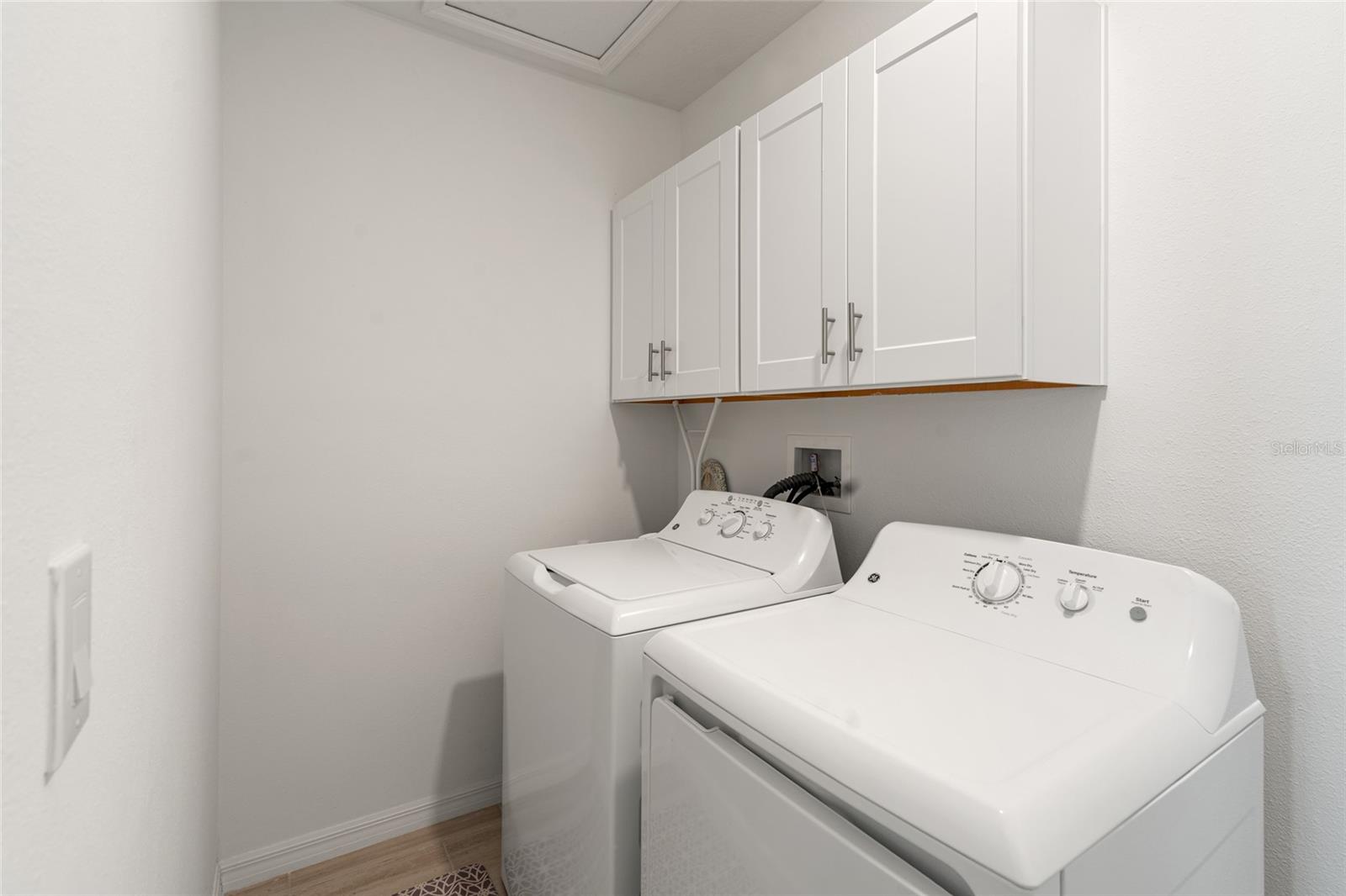 Interior Laundry Room With Cabinets