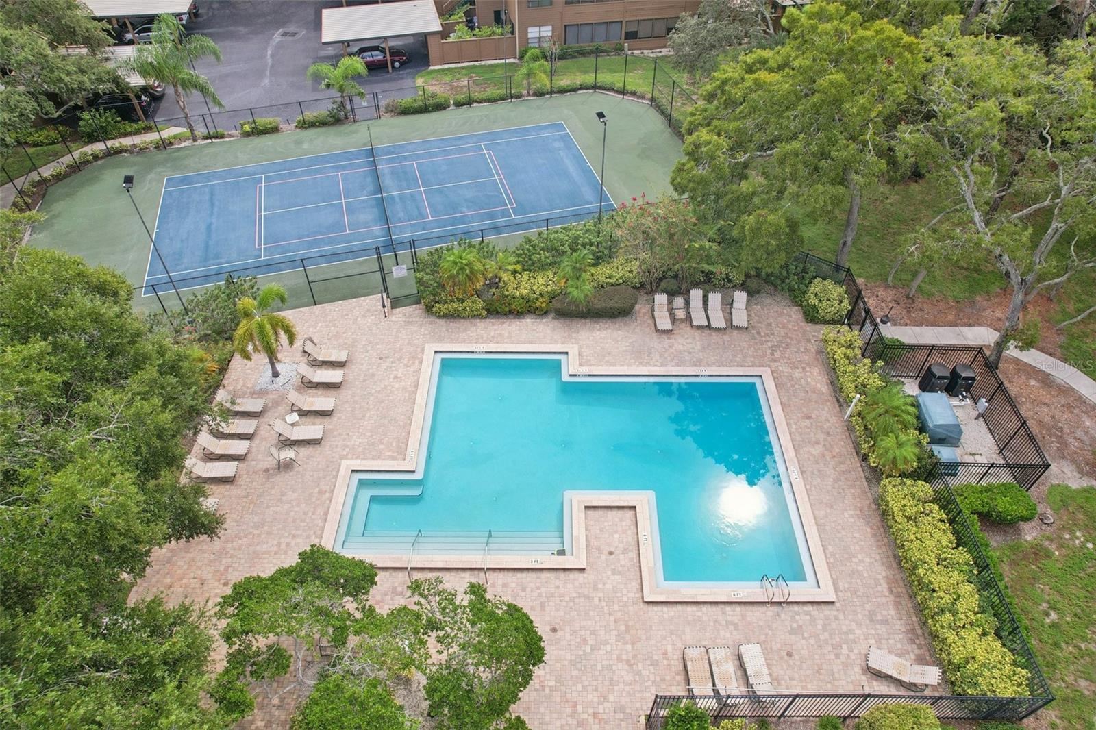 Walk across green park-like area to amenities!