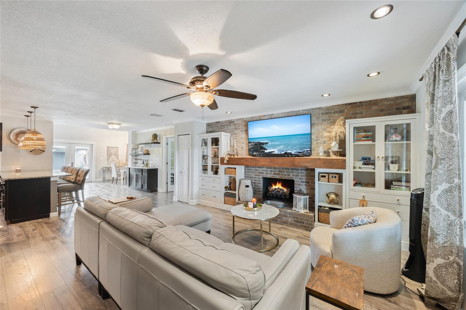 Living Room w/ Built Ins & Fireplace