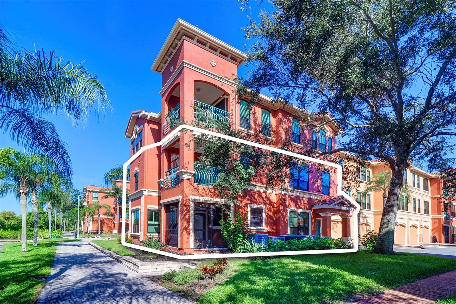 Two story townhome is highlights from the promenade on the waterfront