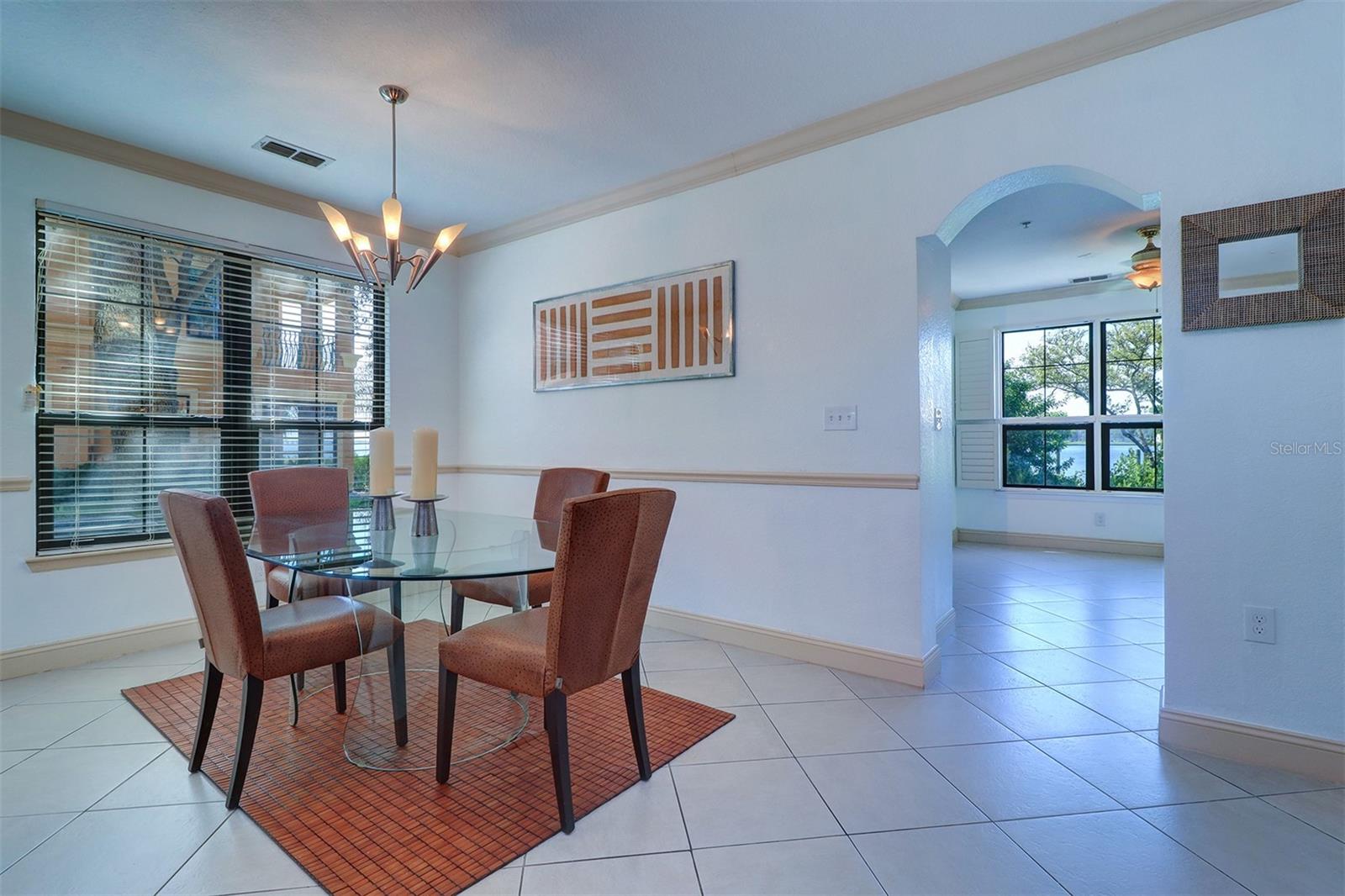 Dining room with kitchen entry on the right