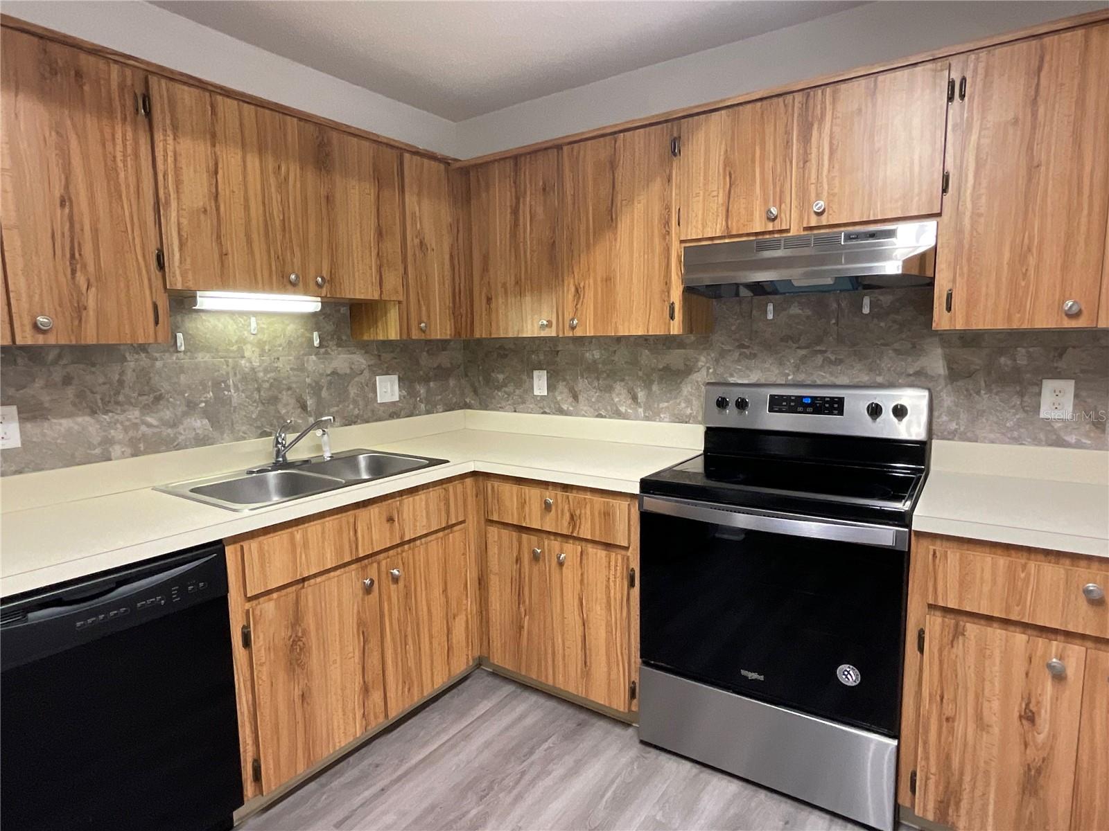 5-Kitchen counters and cabinets.