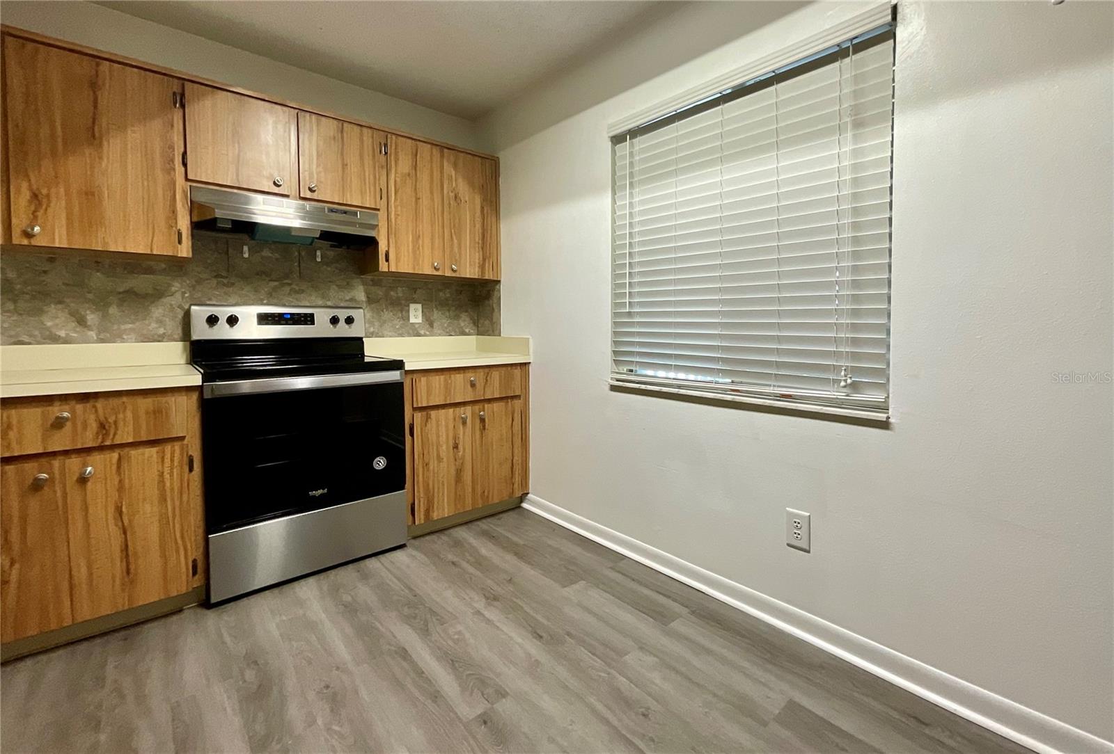 7-Kitchen range area and front window