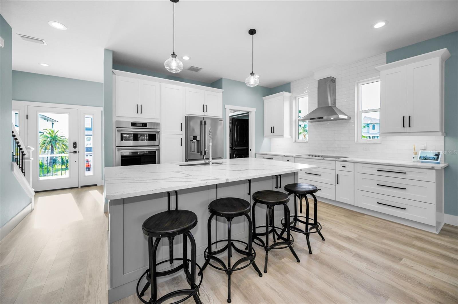 Gorgeous! Shaker cabinets and Breakfast Bar