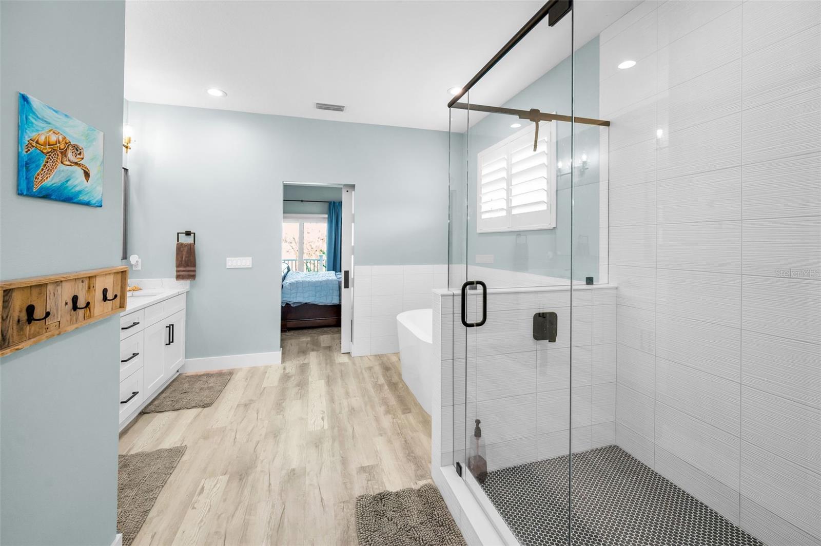 Primary Bathroom with tub and walk in shower