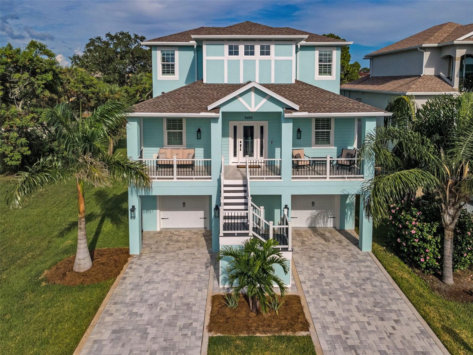 Aerial View  Double garage doors, Spacious porch