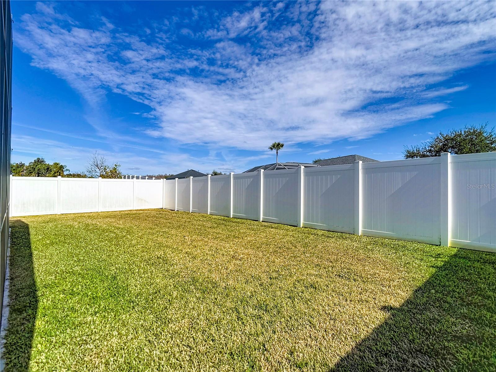 Spacious, fully fenced backyard