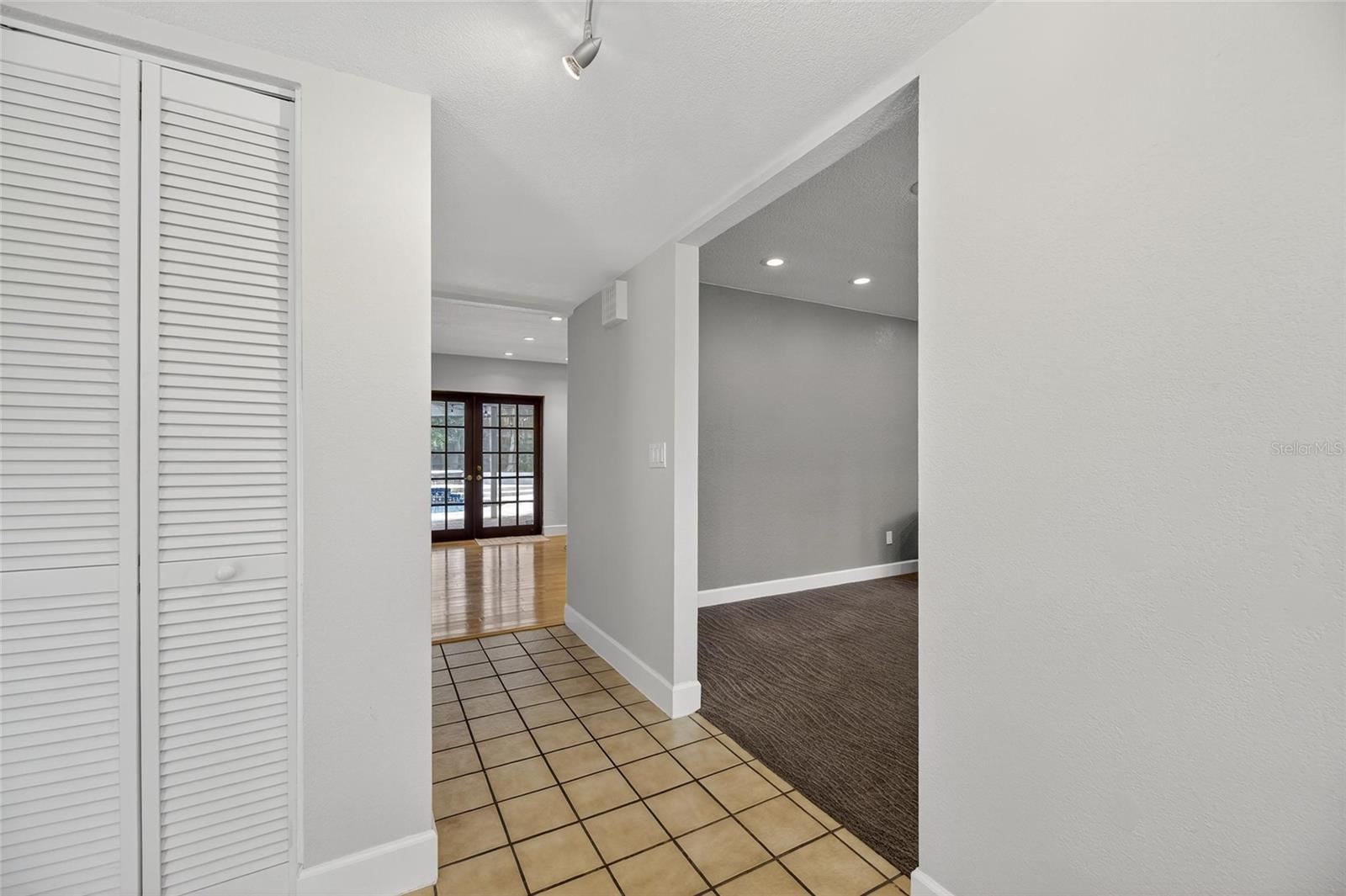 Foyer looking into den