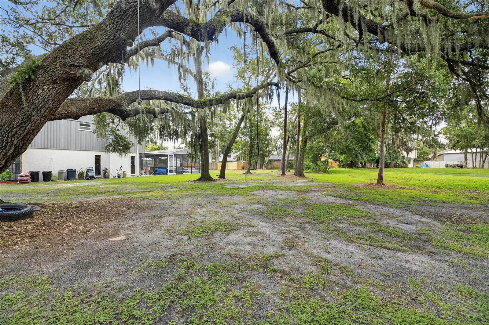 Lot is .64 acres and has beautiful grandfather oaks.