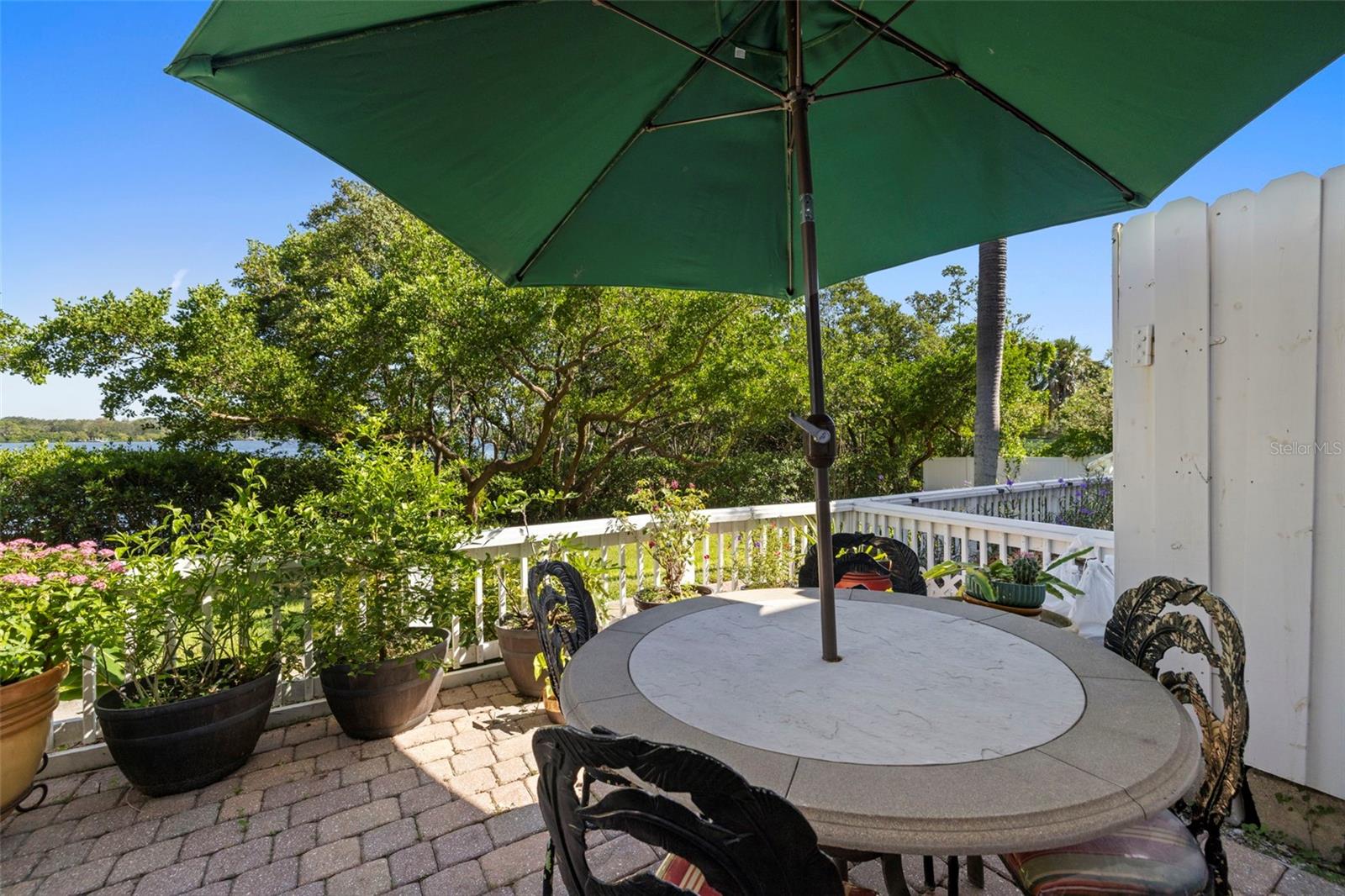 Breathtaking Views** Enjoy daily sights of the Big Bayou, boats, dolphins, and manatees from your oversized covered lanai, finished with pavers and a tongue-and-groove wood ceiling.